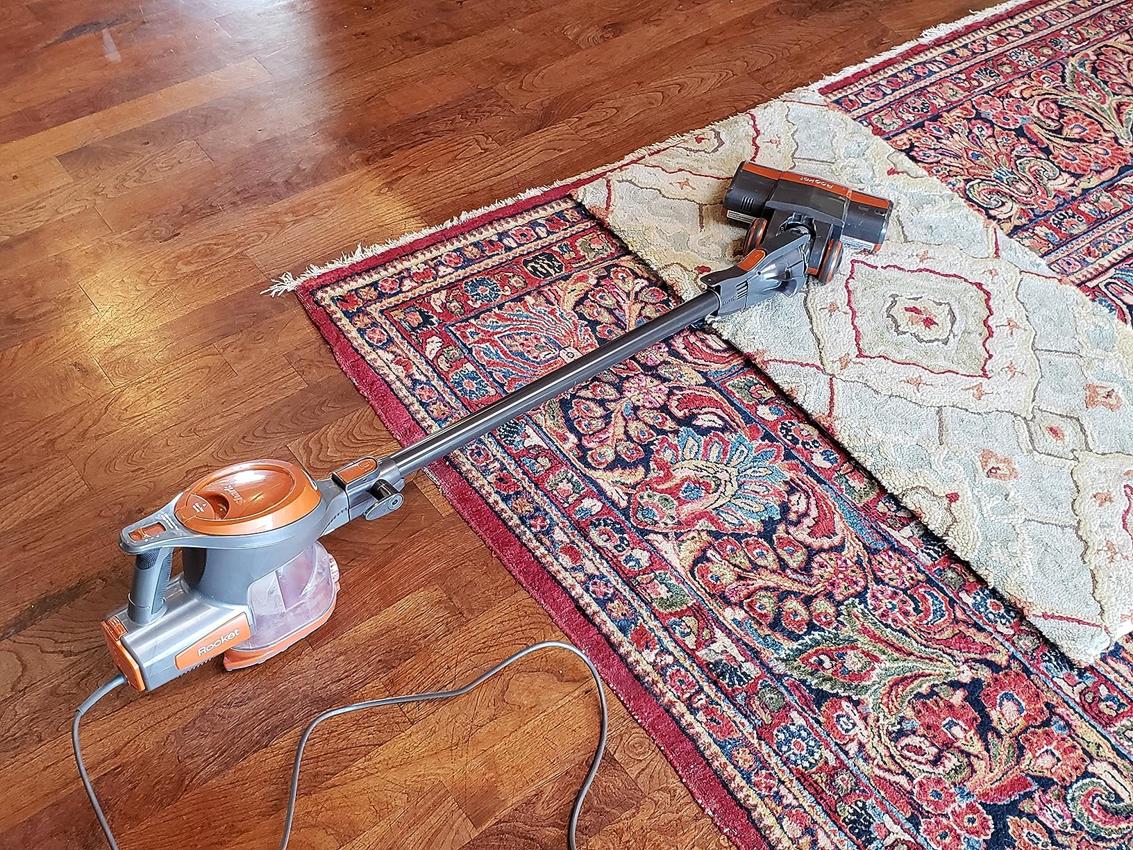 Shark Rocket HV302 Ultra-Light Corded Bagless Vacuum for Carpet and Hard Floor Cleaning with Swivel Steering, Orange (Renewed) Customer Review Shark Rocket HV302 Ultra-Light Corded Bagless Vacuum for Carpet and Hard Floor Cleaning with Swivel Steering, Orange (Renewed) - Customer Photo 1