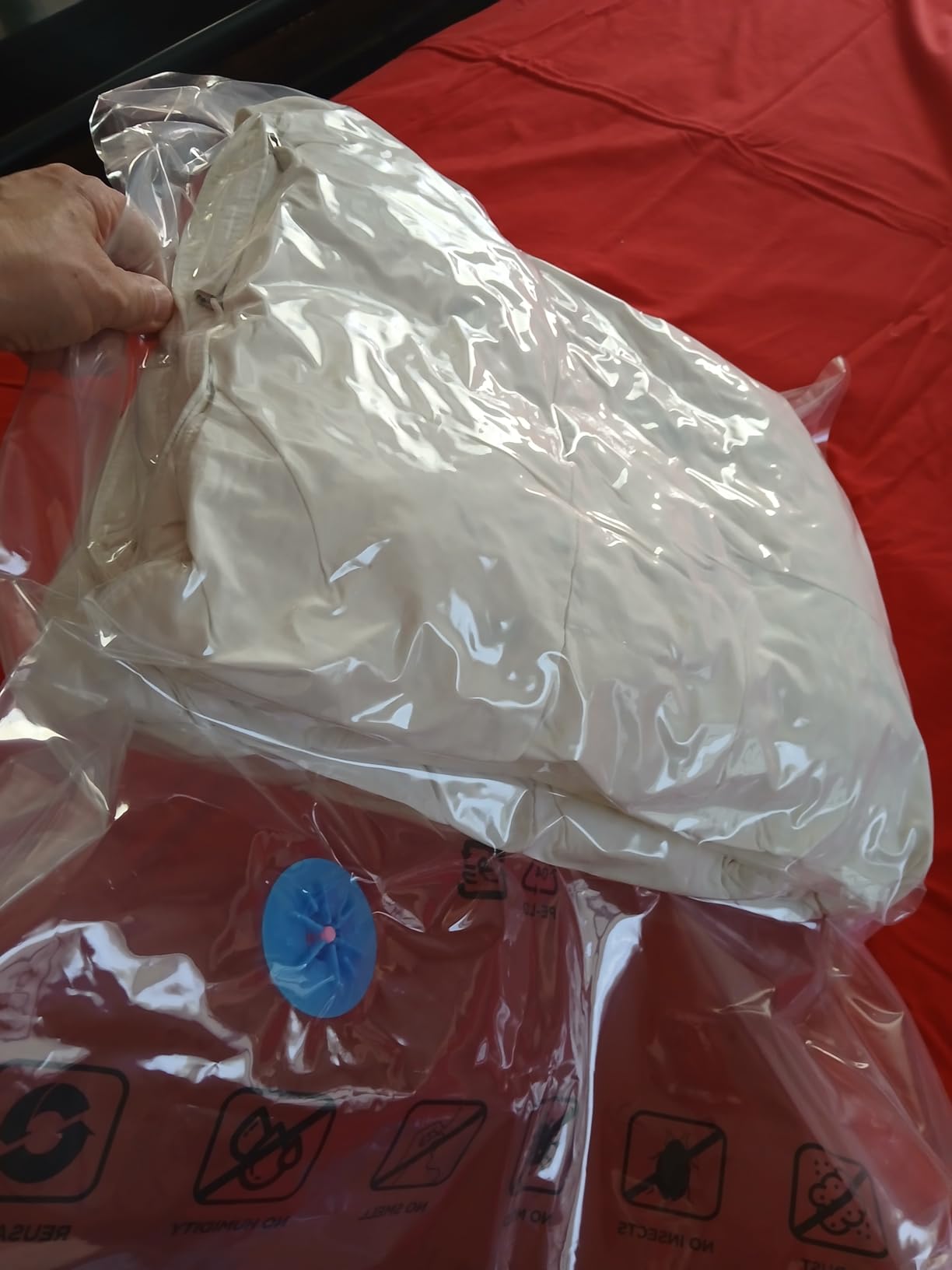 Amazon Basics Vacuum Compression Space Saving Storage Bags with Hand Pump for Travel, Multiple Sizes for Clothes and Blankets, Clear, 20 Pack (5 Small, 5 Medium, 5 Large & 5 Jumbo) Customer Review Amazon Basics Vacuum Compression Space Saving Storage Bags with Hand Pump for Travel, Multiple Sizes for Clothes and Blankets, Clear, 20 Pack (5 Small, 5 Medium, 5 Large & 5 Jumbo) - Customer Photo 1