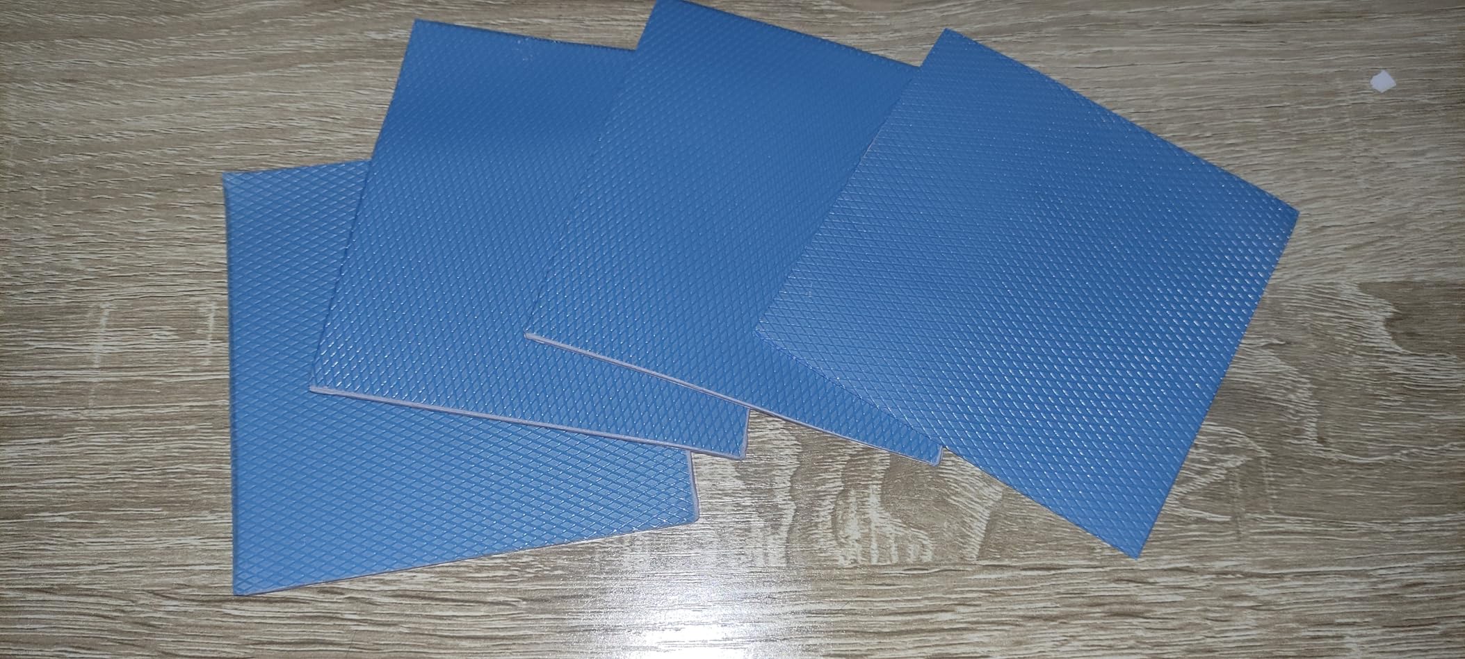 4 Pack 13W/m.K Thermal Pads, 100 x 100mm 0.5mm+1mm+1.5mm+2mm Silicone Cooling Pad Non Conductive Heat Resistance Extreme Odyssey Cover with Dual Self-Adhesive Films for PC Laptop PS4 Customer Review 4 Pack 13W/m.K Thermal Pads, 100 x 100mm 0.5mm+1mm+1.5mm+2mm Silicone Cooling Pad Non Conductive Heat Resistance Extreme Odyssey Cover with Dual Self-Adhesive Films for PC Laptop PS4 - Customer Photo 1