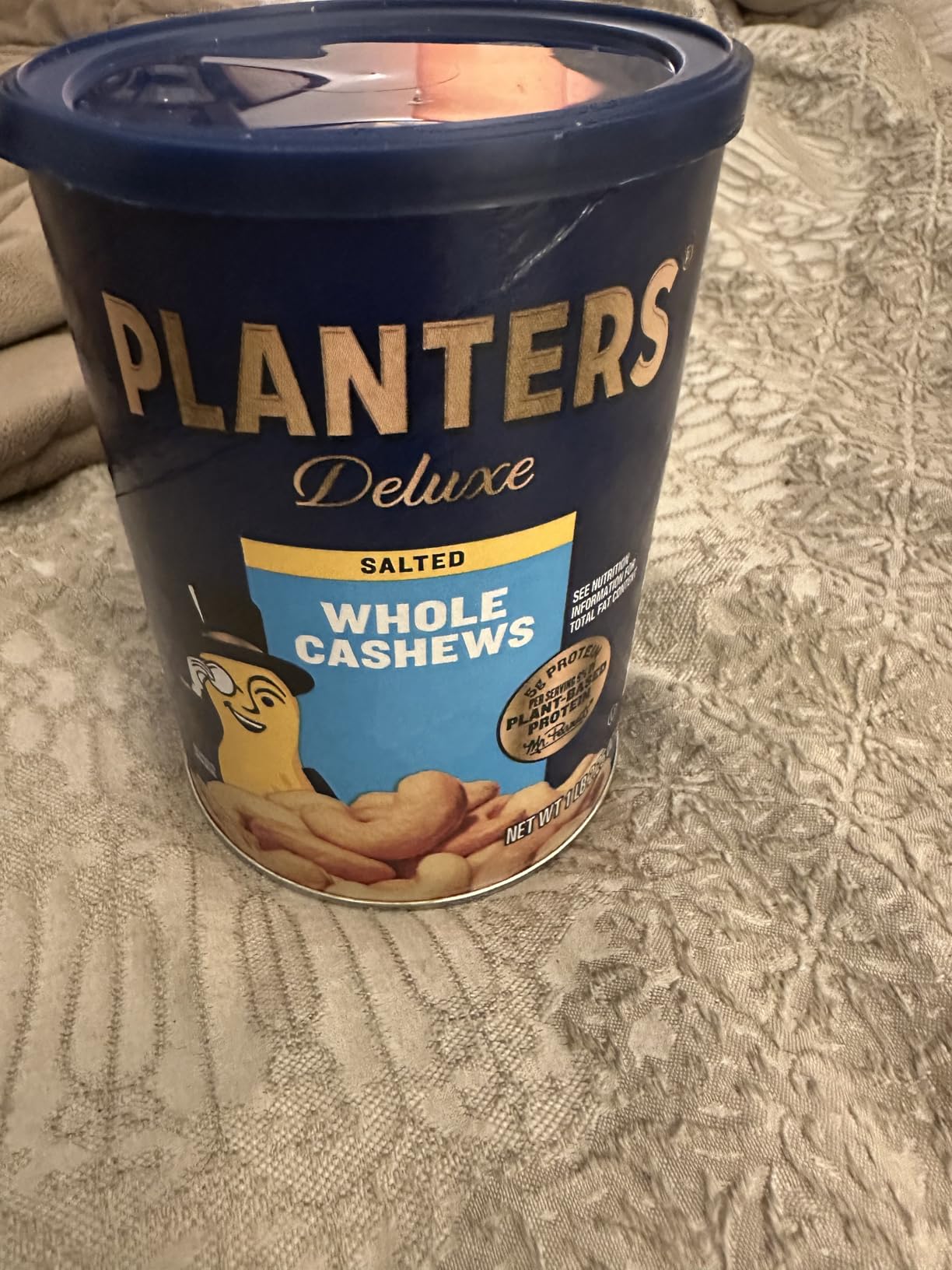 PLANTERS Deluxe Salted Whole Cashews, Party Snacks, Plant-Based Protein, Quick Snack for Adults, After School Snack, Roasted Cashew Flavored with Sea Salt, Bulk Nuts, Kosher, 1 lb 2.25oz Canister - Customer Photo 1