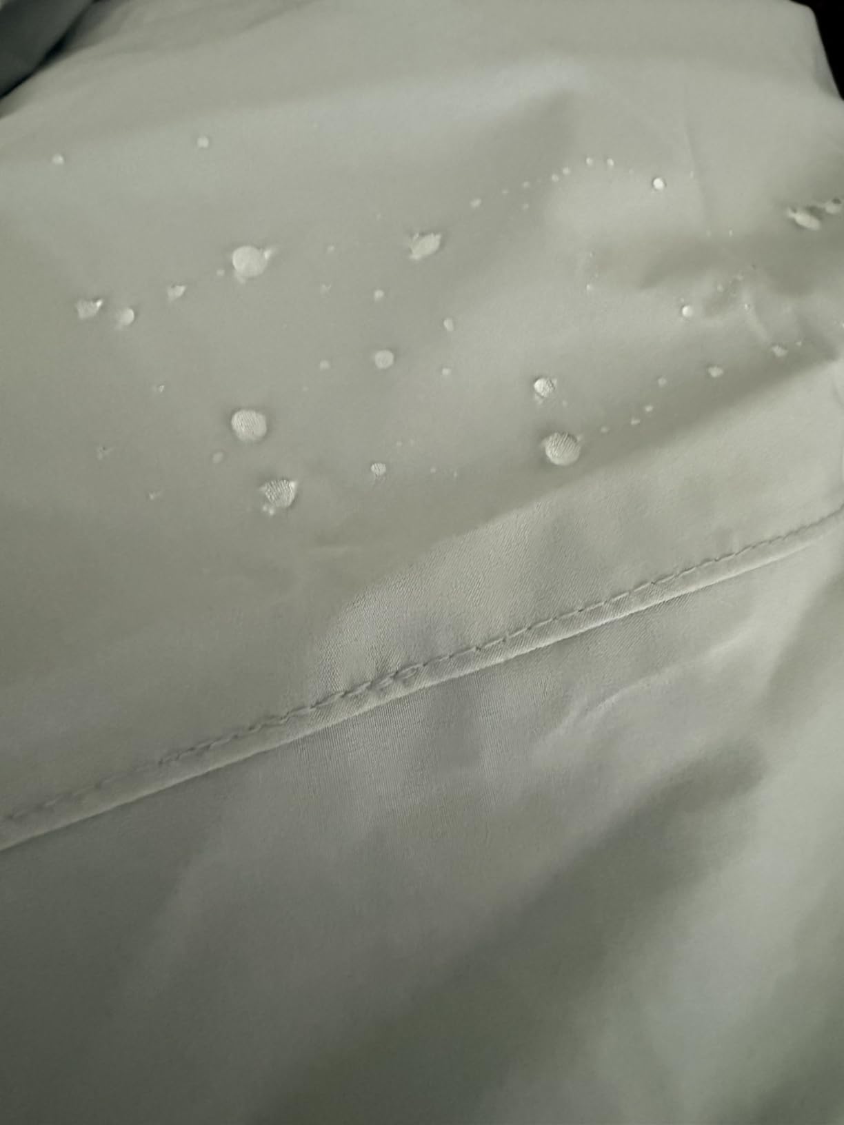 Amazon Essentials Women's Relaxed-Fit Lightweight Waterproof Long Hooded Rain Jacket - Customer Photo 1