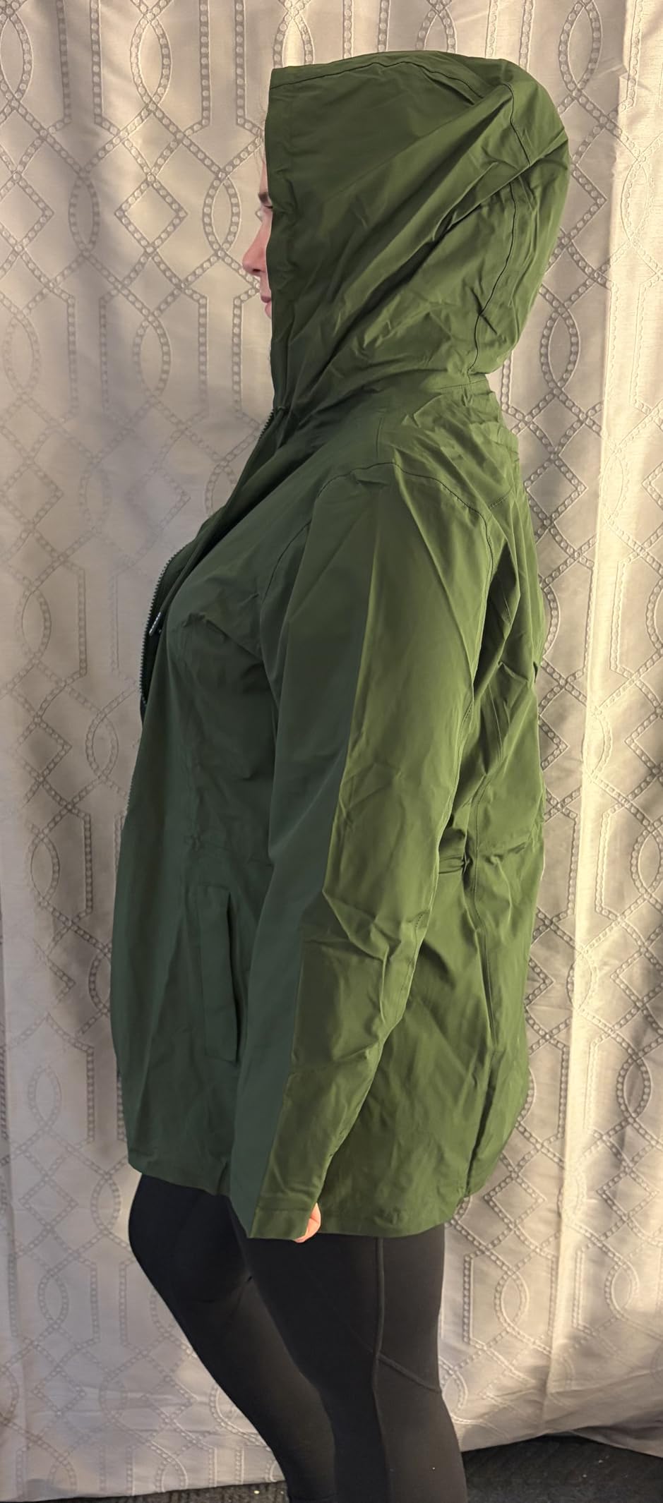 Amazon Essentials Women's Relaxed-Fit Lightweight Waterproof Long Hooded Rain Jacket - Customer Photo 2