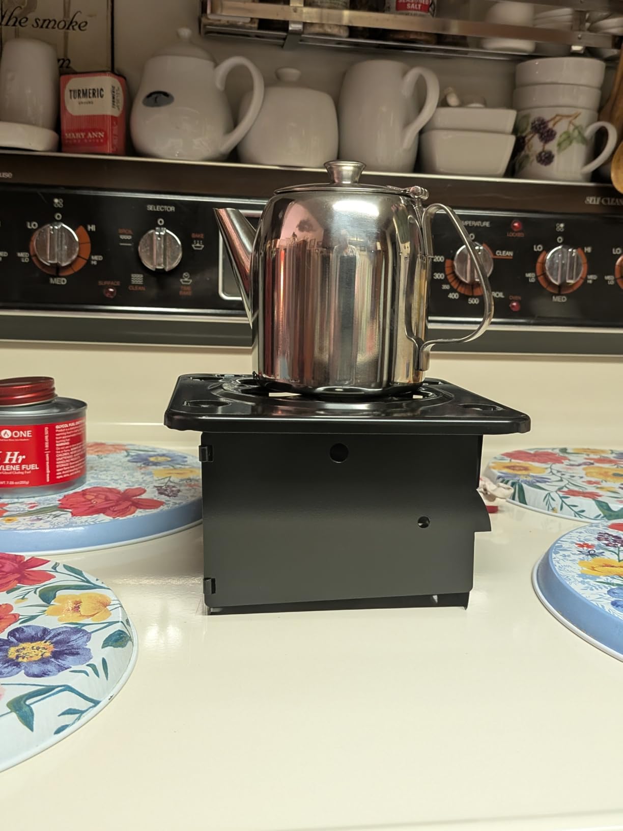 Coghlan's Portable Folding Camp Stove - Compact, Lightweight Steel Cooking Stove for Camping, Backpacking, Hiking, or Emergency Use - Uses Canned Heat or Fuel Tablets, Black - Customer Photo 1
