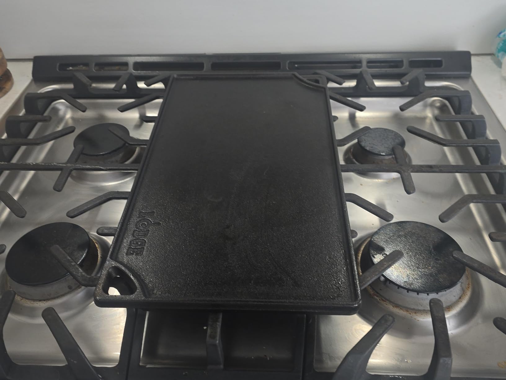 Lodge Reversible Cast Iron Grill/Griddle - 9.5 x 16.75 Inch Pre-Seasoned Cooking Surface - Flat & Ribbed Sides - Use on Stove, Grill, or Campfire - Made in the USA - Heavy-Duty, Black - Customer Photo 1