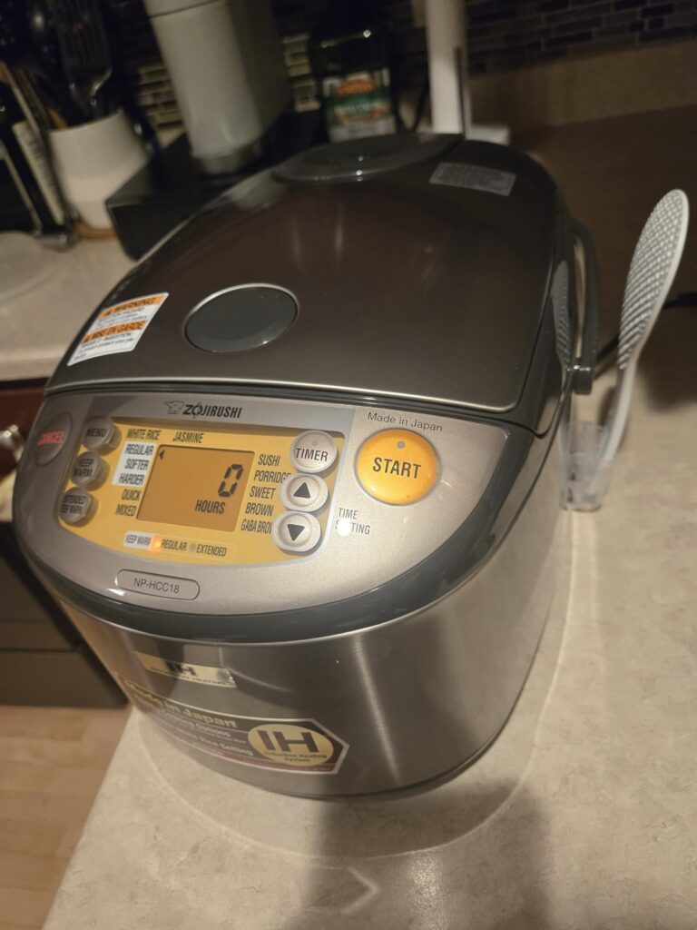 Zojirushi NP-HCC10XH Induction Heating System Rice Cooker and Warmer, 5.5-Cup, Stainless Dark Gray Customer Review Best Induction Rice Cooker