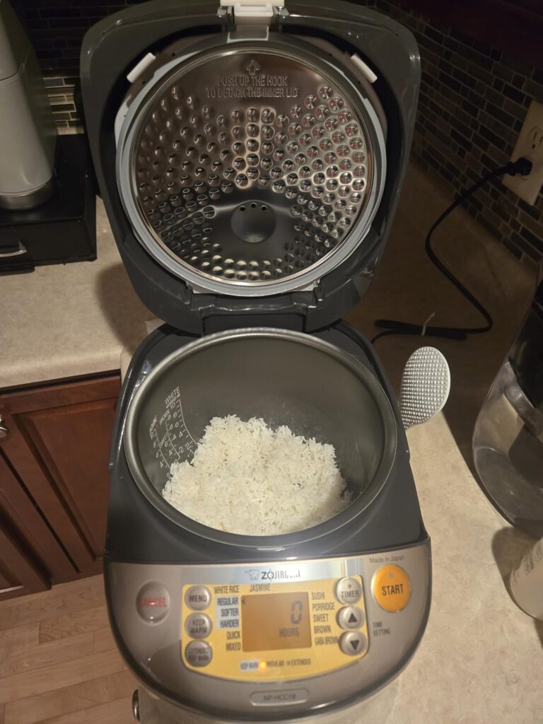 Zojirushi NP-HCC10XH Induction Heating System Rice Cooker and Warmer, 5.5-Cup, Stainless Dark Gray Customer Review Best Induction Rice Cooker
