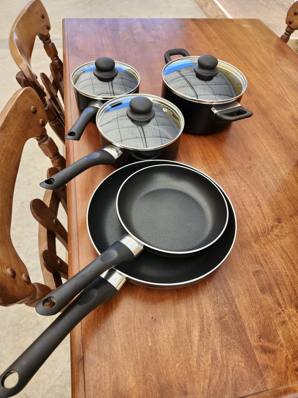 Amazon Basics Non Stick Kitchen Cookware 8-Piece Set, Non-Induction, Includes Pots and Pans, Black Customer Review Amazon Basics Non Stick Kitchen Cookware 8-Piece Set, Non-Induction, Includes Pots and Pans, Black - Customer Photo 1
