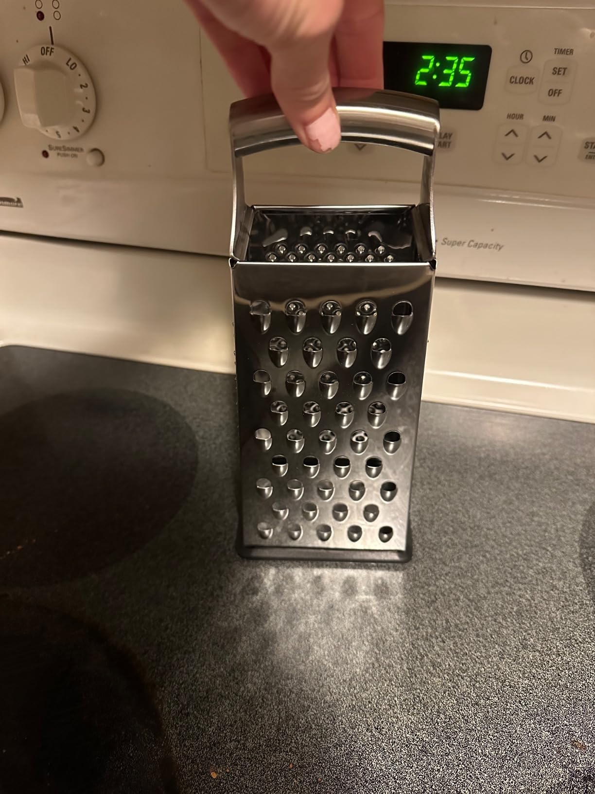 Amazon Basics Rectangular 4-Sided Box Cheese Grater, Stainless Steel, Zester, Non-Slip Base, Dishwasher-Safe, 9 inch, Black Customer Review Amazon Basics Rectangular 4-Sided Box Cheese Grater, Stainless Steel, Zester, Non-Slip Base, Dishwasher-Safe, 9 inch, Black - Customer Photo 1