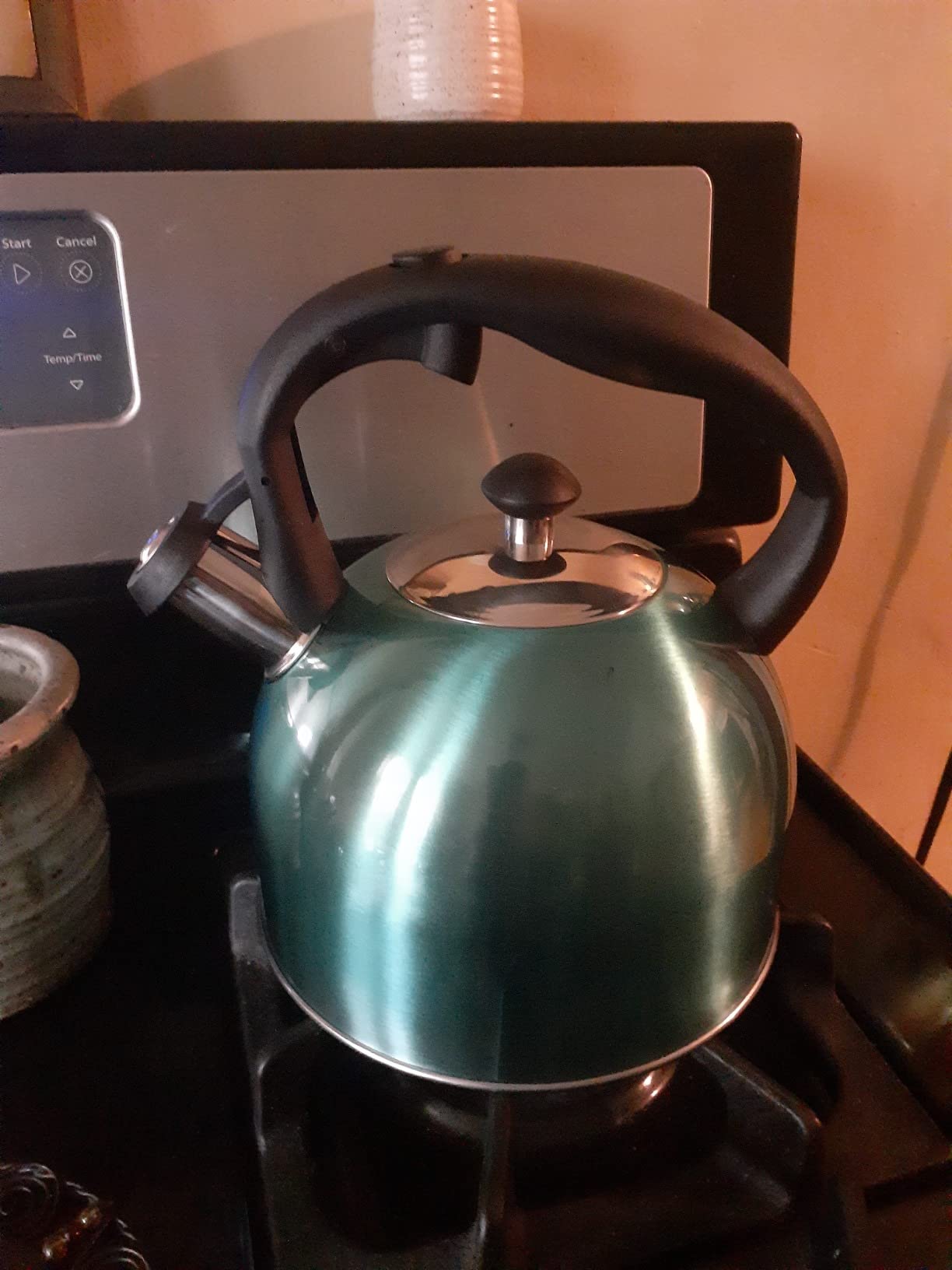 Amazon Basics Stainless Steel Tea Kettle, Hot Water Kettle with Whistle Spout, Fast Boiling, Ergonomic Handle, 2.3 Liter, Teal Customer Review Amazon Basics Stainless Steel Tea Kettle, Hot Water Kettle with Whistle Spout, Fast Boiling, Ergonomic Handle, 2.3 Liter, Teal - Customer Photo 1