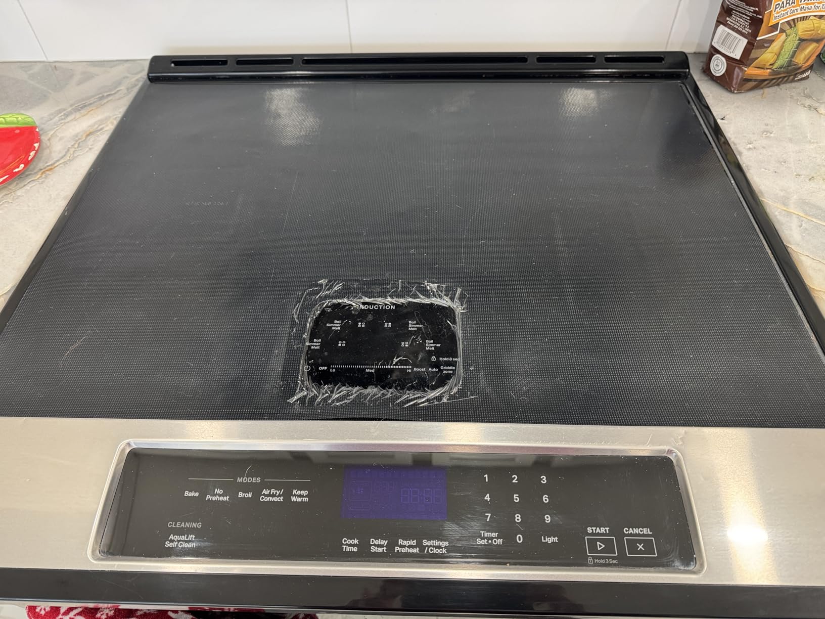 KitchenRaku Large Induction Cooktop Protector Mat 21.2x35.4 IN,Translucent (Magnetic) Electric Stove Burner Covers Antiscratch as Glass Top Stove Cover or Electric Stove Top Customer Review KitchenRaku Large Induction Cooktop Protector Mat 21.2x35.4 IN,Translucent (Magnetic) Electric Stove Burner Covers Antiscratch as Glass Top Stove Cover or Electric Stove Top - Customer Photo 1