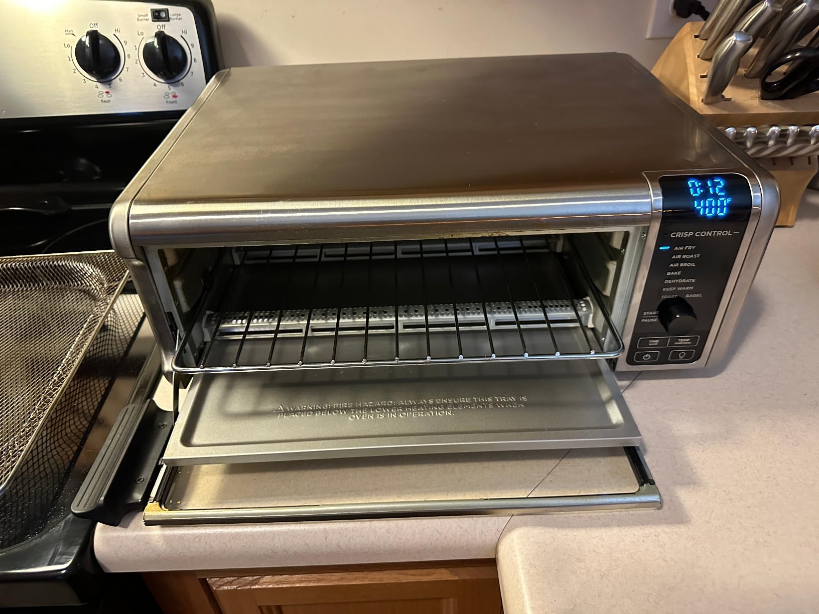 Ninja Air Fryer Toaster Oven Combo | 8-in-1 Functionality | Flip Up & Away for Storage Space | Air Fry Basket, Sheet Pan, Wire Rack & Removable Crumb Tray | 1800 Watt | Stainless Steel | SP151 customer photo 2