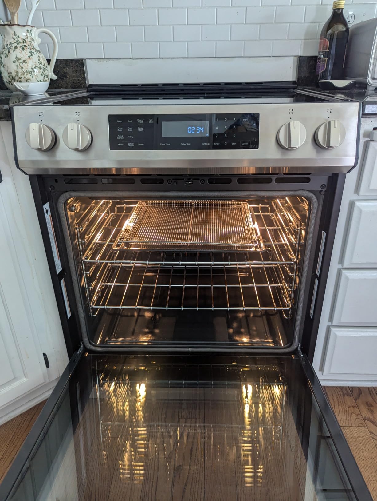 Kenmore 2296853 5.6 cu. ft. Front Control Electric Induction Range Oven - 4 Dual Ring Elements, True Convection, Air Fry, Self Clean, Turbo Boil, Chrome Racks, Storage Drawer - Stainless Steel Customer Review Kenmore 2296853 5.6 cu. ft. Front Control Electric Induction Range Oven - 4 Dual Ring Elements, True Convection, Air Fry, Self Clean, Turbo Boil, Chrome Racks, Storage Drawer - Stainless Steel - Customer Photo 2