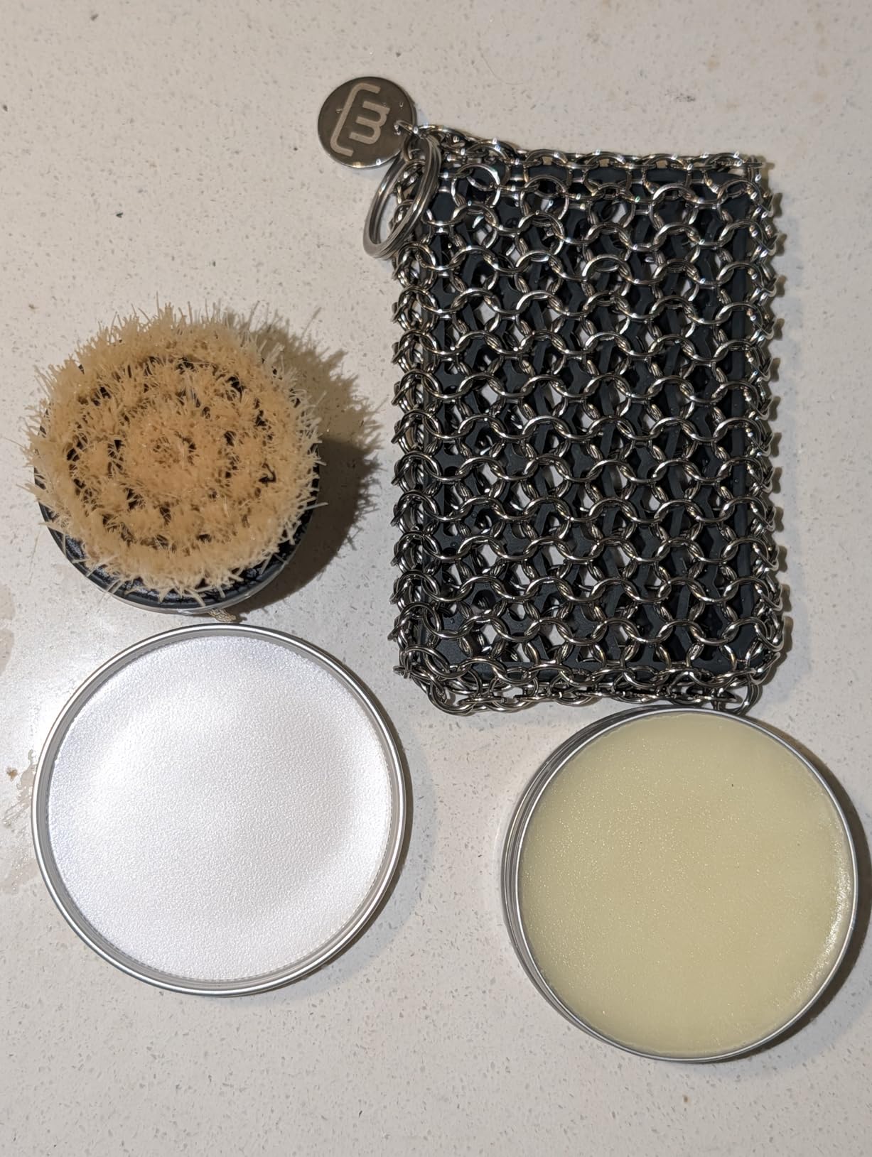 Made In Cookware - 3-Piece Carbon Steel Cleaning Set - Includes Chain Mail Scrubber, Cleaning Brush and Carbon Steel Seasoning Wax Customer Review Made In Cookware - 3-Piece Carbon Steel Cleaning Set - Includes Chain Mail Scrubber, Cleaning Brush and Carbon Steel Seasoning Wax - Customer Photo 1
