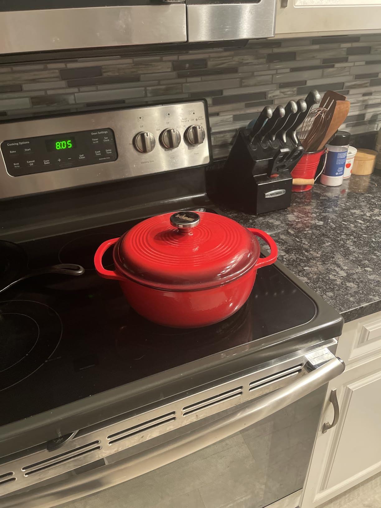 Lodge 4.5 Quart Enameled Cast Iron Dutch Oven with Lid - Dual Handles - Oven Safe up to 500° F or on Stovetop - Use to Marinate, Cook, Bake, Refrigerate and Serve - Island Spice Red customer photo 1