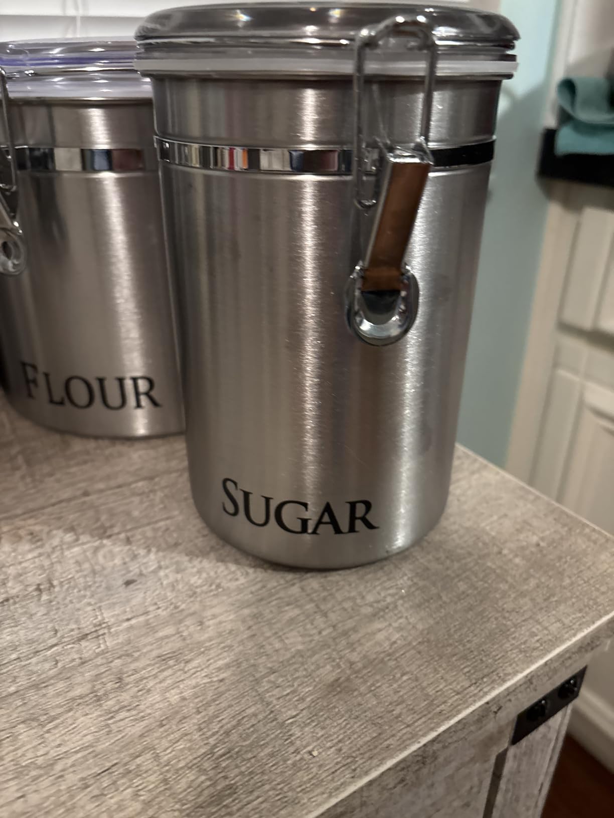 Oggi Stainless Steel Sugar Canister 62 fl oz - Airtight Clamp Lid, Clear See-Thru Top - Ideal Sugar Container for Countertop, Sugar Jar, Bulk Sugar Storage. Large Size 5