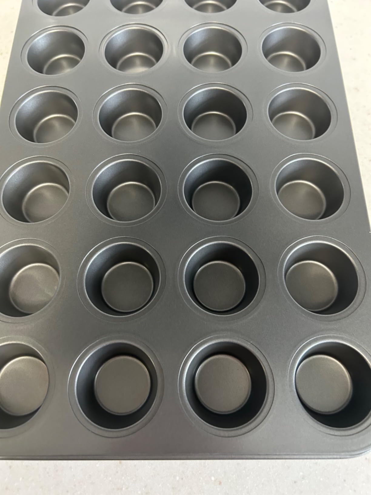 Nonstick 24 Cups Mini Muffin Pan with Extended Handles for Easy Grip, Carbon Steel Steel to Promoted Even Baking, Dishwasher Safe (Black) customer photo 2