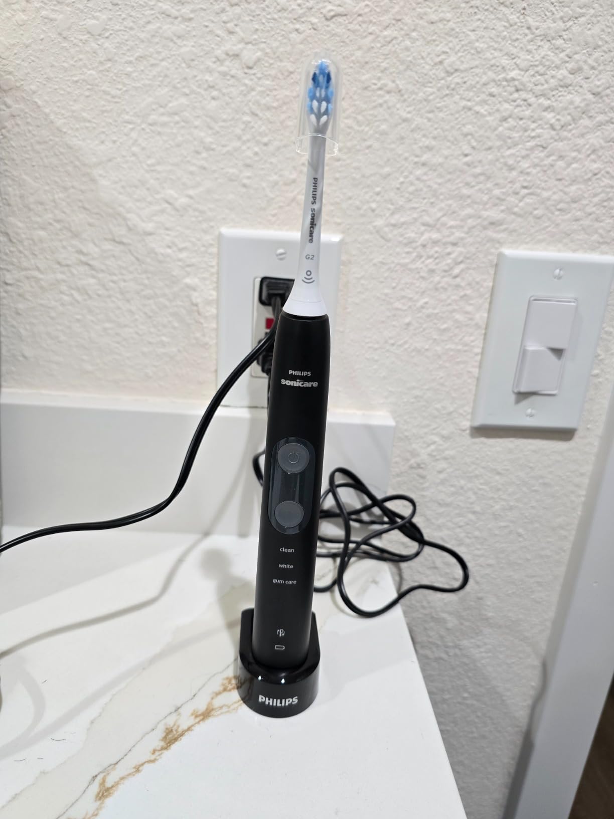 Philips Sonicare ProtectiveClean 5100 Rechargeable Electric Toothbrush, with Pressure Sensor, 3 Cleaning Modes, SmarTimer and QuadPacer, 14-Day Battery Life, Travel Case, White, Model HX6857/11 customer photo 1