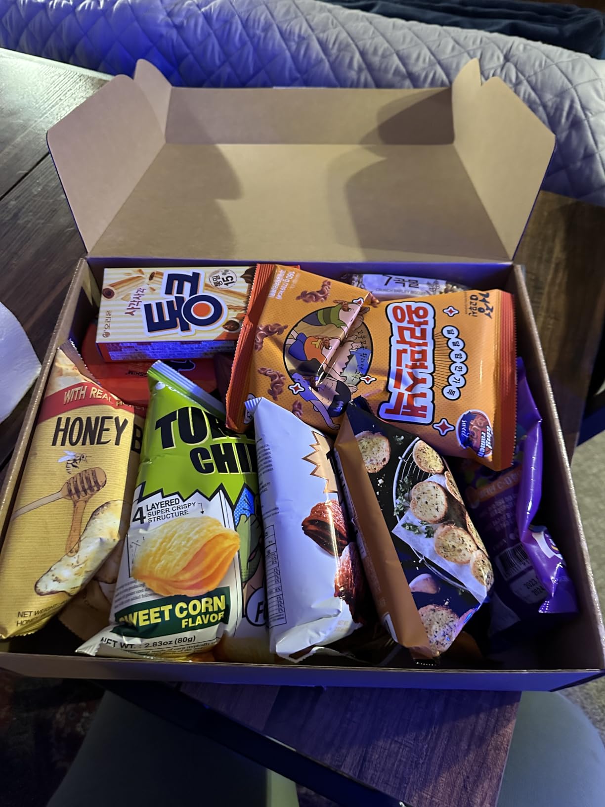 K-Munchies Asian Snacks Box - Snacks Variety Pack for Adults and Kids with Candy, Chips, Ramen, and Other Instant Food - Mystery Snack Box Treats for Family - With Free Chopsticks customer photo 1