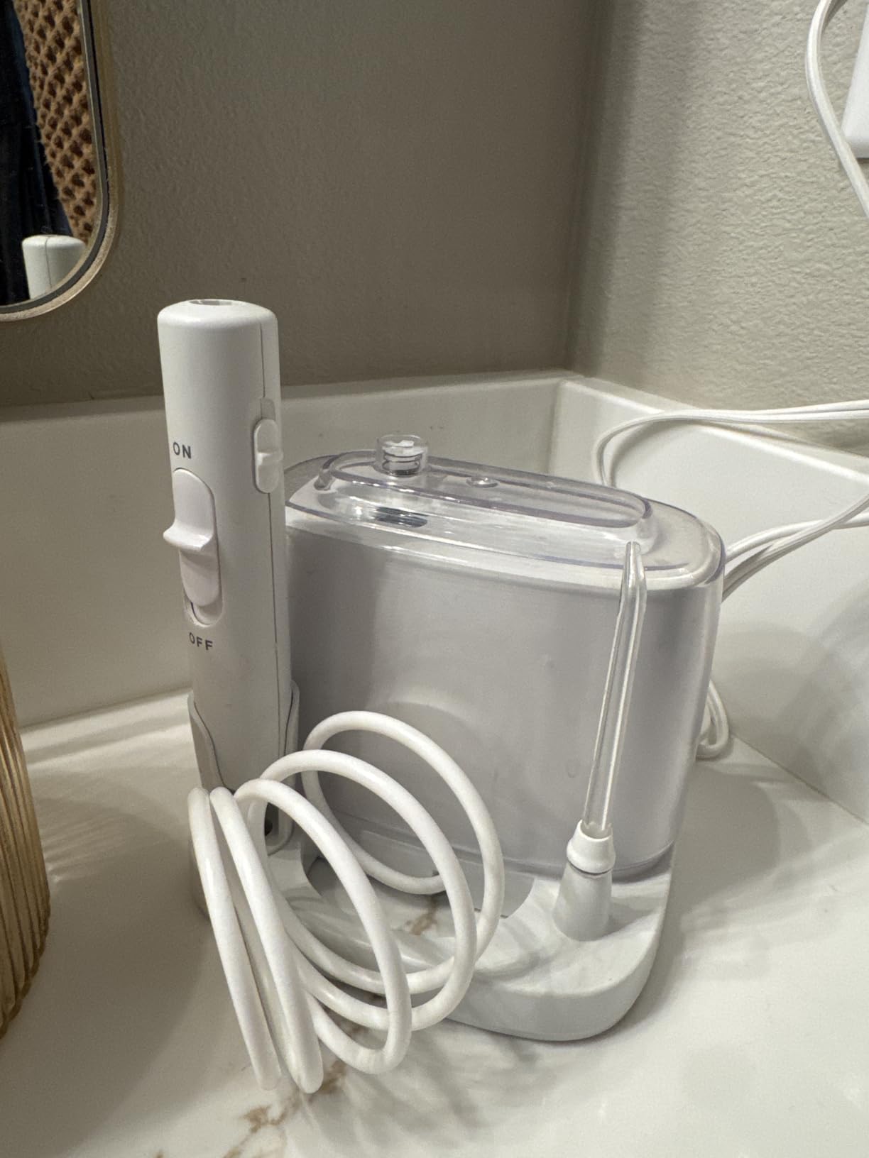 Waterpik Nano Plus Water Flosser For Teeth, Portable Electric Power, Compact For Travel and Home, 4 Flossing Tips, ADA Accepted, White WP-320 customer photo 2