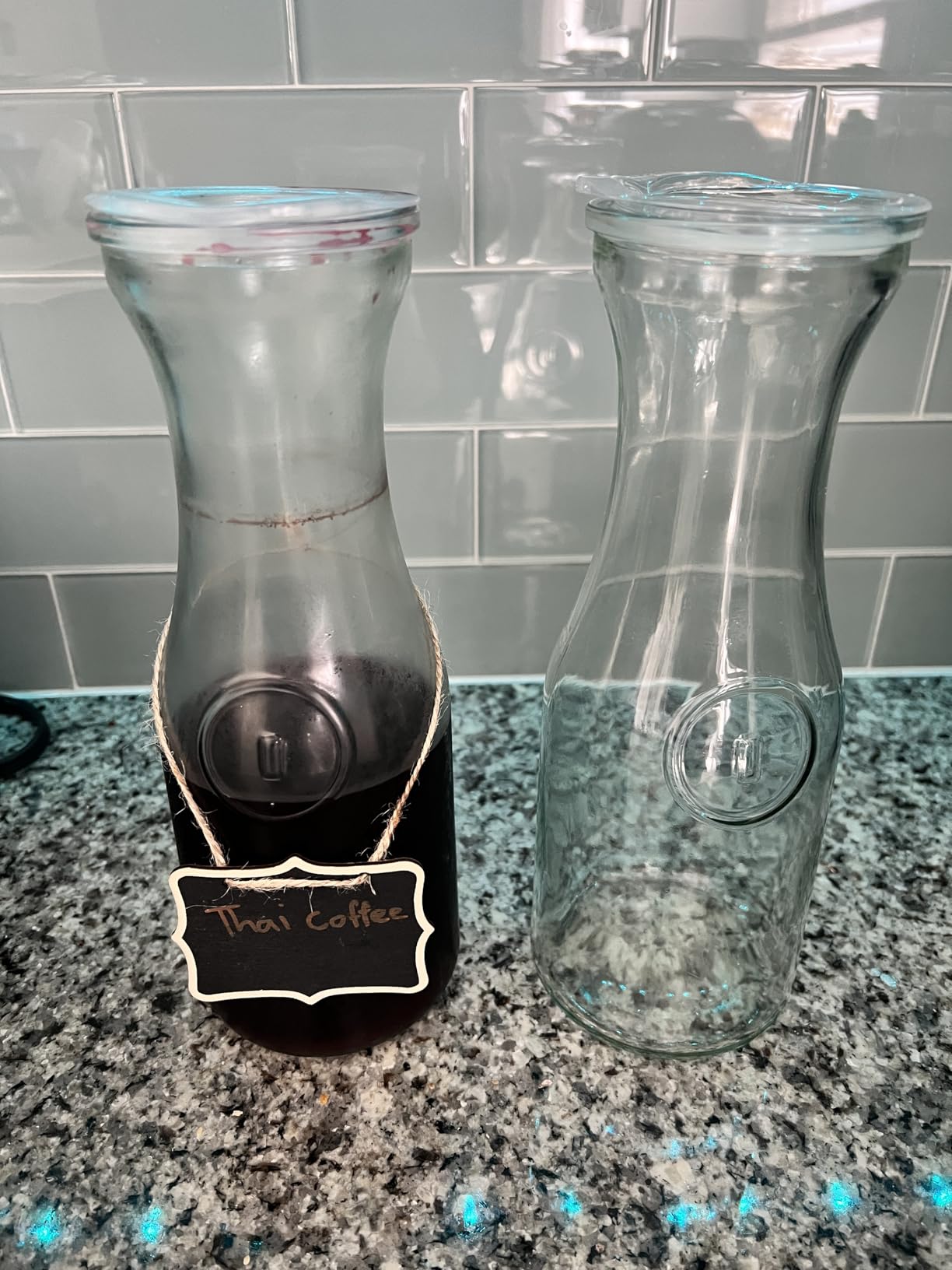 NETANY Set of 4 Glass Carafe with Lid, 1 Liter Beverage Serveware Carafe, Clear Glass Pitcher for Mimosa Bar, Brunch, Cold Water, Juice, Milk, Iced Tea, Lemonade customer photo 1