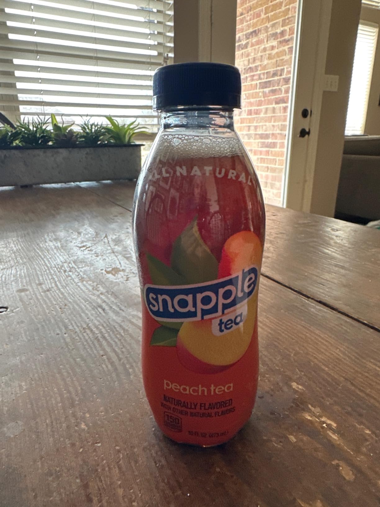 Snapple Peach Tea, 16 fl oz recycled plastic bottle, Pack of 12 customer photo 1