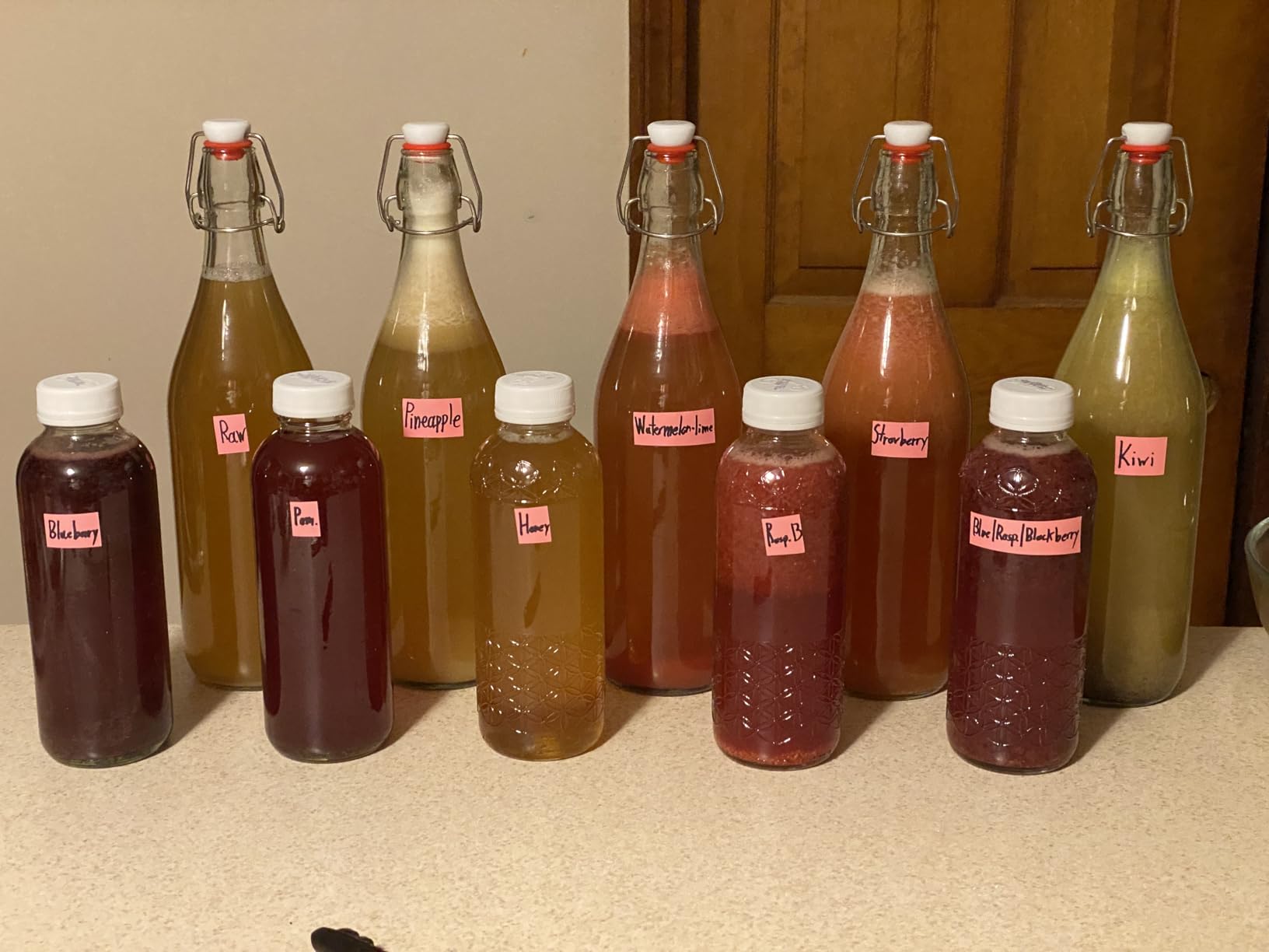 8 Pack [1 L / 33 fl. oz.] Swing Top Glass Bottles w/ Airtight Stopper Lids - Flip Top Brewing Bottle for Fermentation, Kombucha, Mead, Vinegar, Beer, Kefir, Wine, Soda customer photo 2
