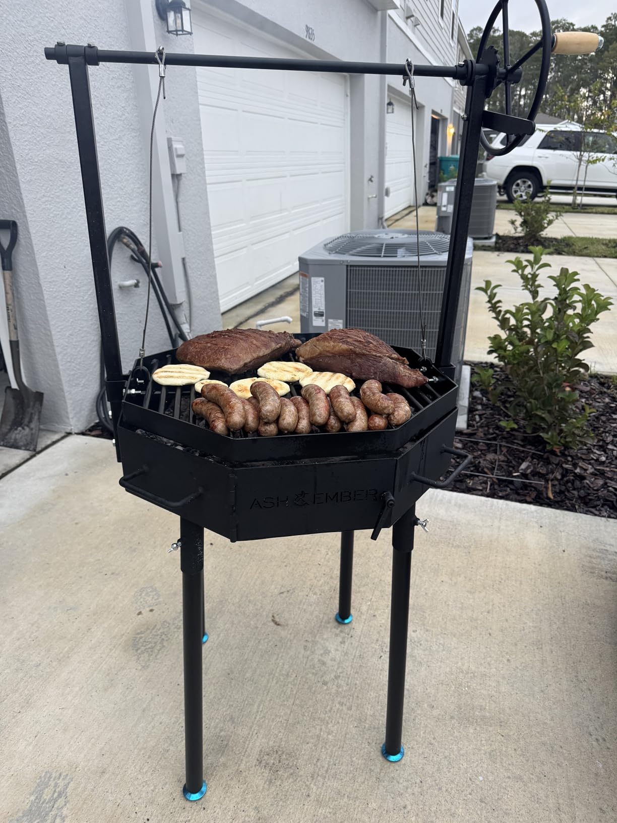 TITAN GREAT OUTDOORS Ash & Ember Santa Maria Grill, Argentine Style Open Fire Grill, Adjustable Cooking Grate with Flywheel, BBQ Grill Comes with Cast Iron Skillet customer photo 1