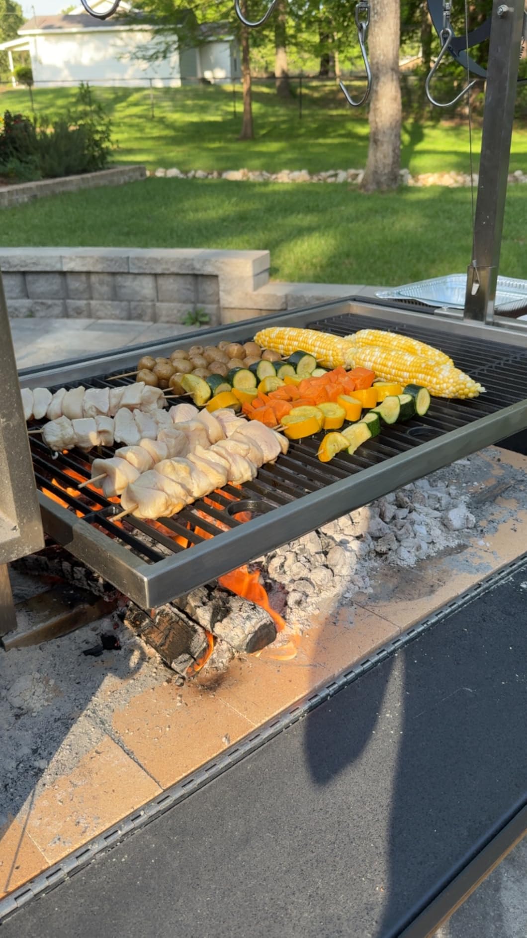 Backyard Discovery Argentine Santa Maria XL Wood Fire & Charcoal Steel BBQ Grill with Asado Clamp, Adjustable Grill Grates, Brasero, Fire Bricks, S-Hooks, Acacia Wood Table customer photo 2