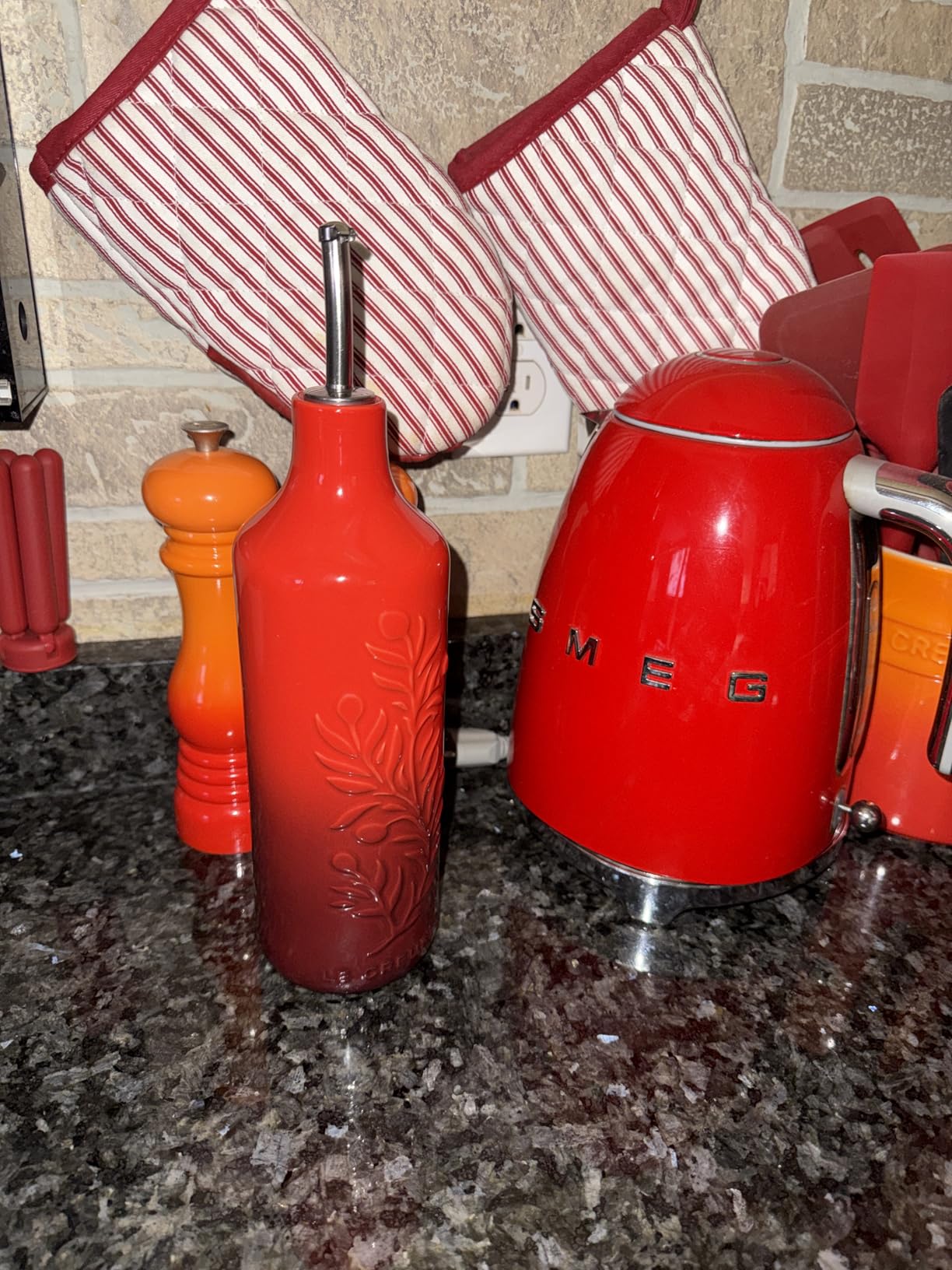 Le Creuset Stoneware Olive Branch Collection Oil Cruet, 20 oz., Cerise customer photo 1