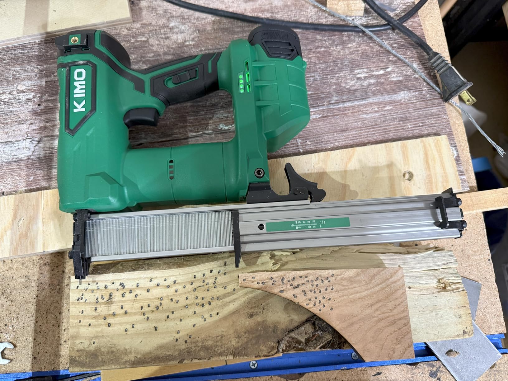 KIMO Brad Nailer Cordless w/ 5000pcs Nails, 2.0Ah Battery X2, 180 Nails/min, Single & Contact Firing, LED Light, Fast Charger,Adjustable Depth 18 GA Cordless Nail Gun for DIY Woodworking Framing customer photo 1