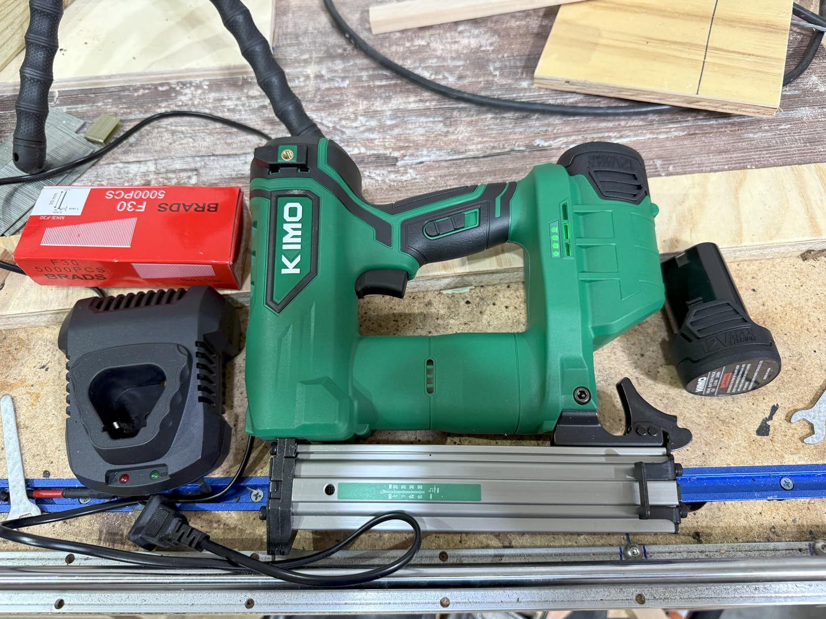 KIMO Brad Nailer Cordless w/ 5000pcs Nails, 2.0Ah Battery X2, 180 Nails/min, Single & Contact Firing, LED Light, Fast Charger,Adjustable Depth 18 GA Cordless Nail Gun for DIY Woodworking Framing customer photo 2