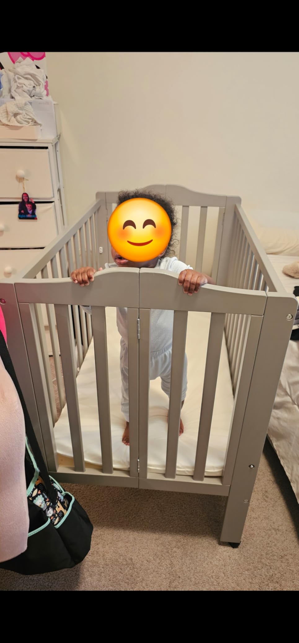 Delta Children Folding Portable Mini Baby Crib with 1.5-inch Mattress - Greenguard Gold Certified, White customer photo 1