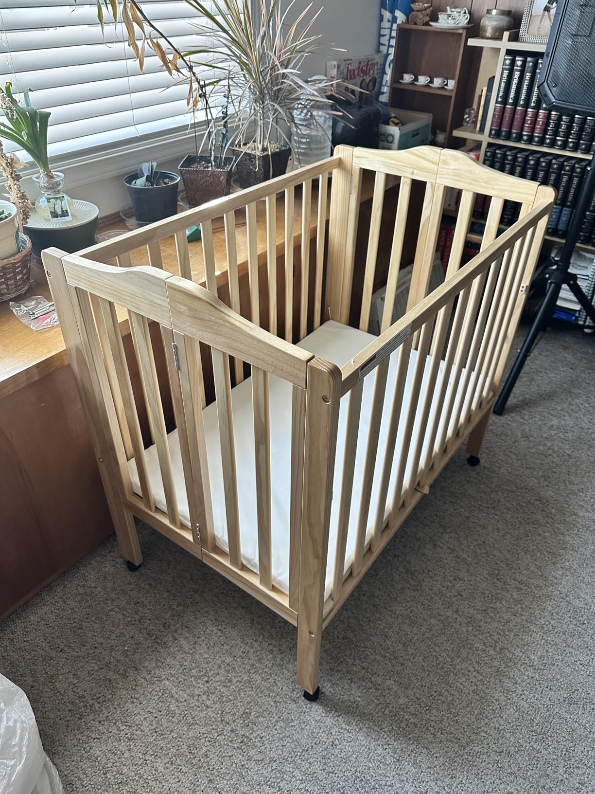 Delta Children Folding Portable Mini Baby Crib with 1.5-inch Mattress - Greenguard Gold Certified, White customer photo 2