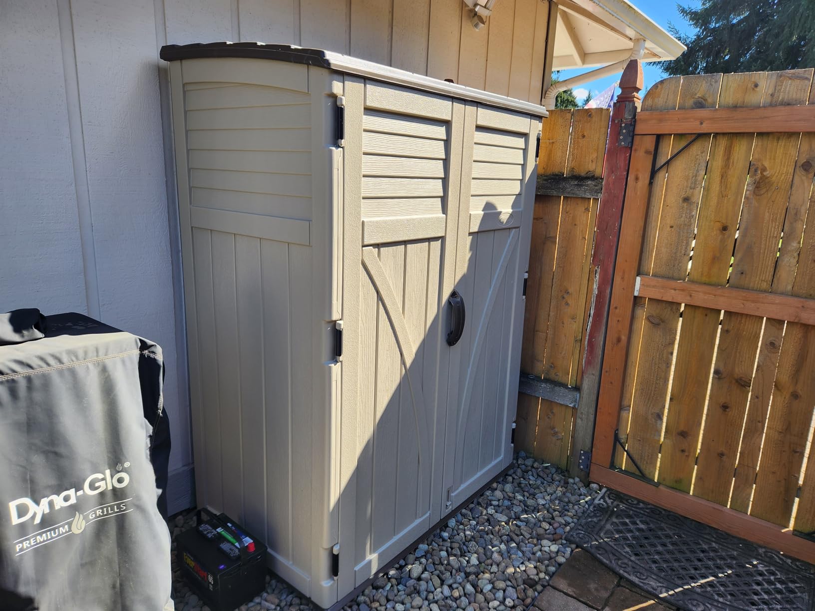 Suncast Outdoor Storage Shed, Water Resistant Resin Vertical Outdoor Storage Cabinet for Patio, Garden Tools, Cushions, & Equipment, Weatherproof Multi-Wall Design, 54 cu. ft., Made in USA customer photo 1