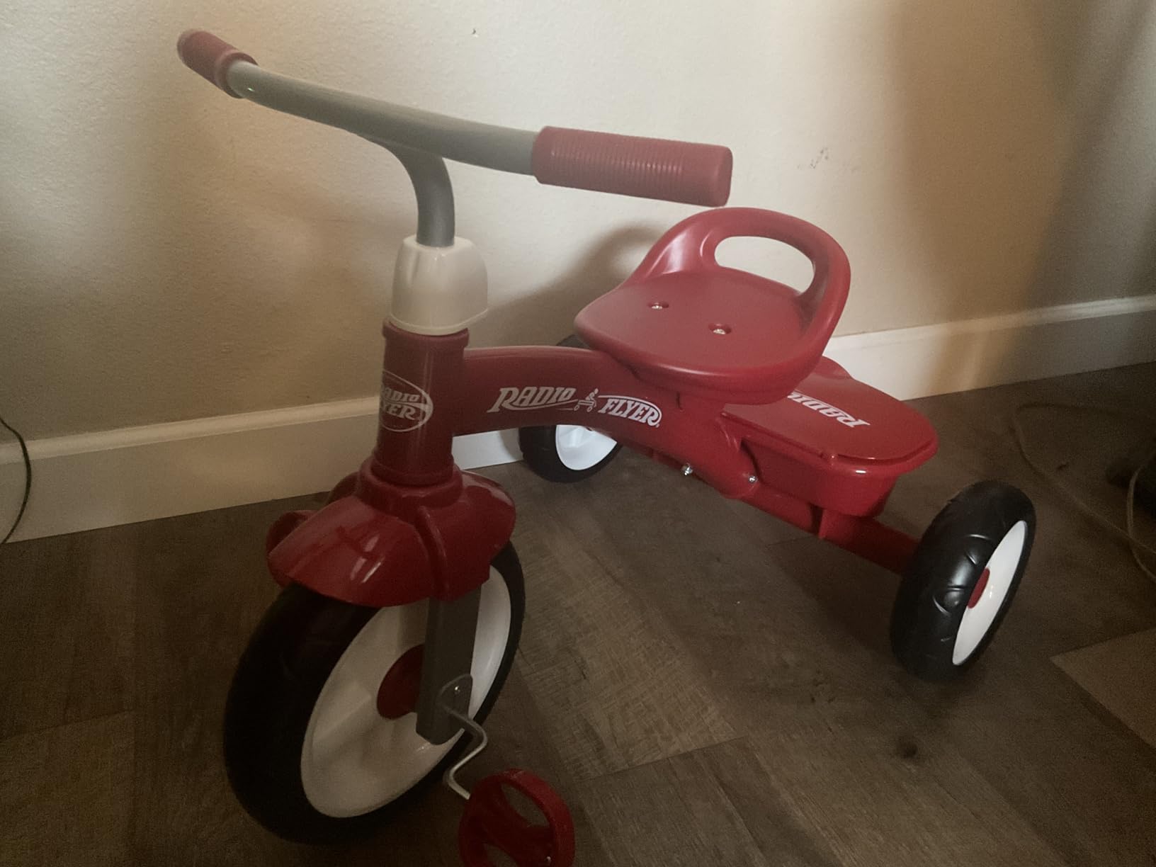 Radio Flyer Red Rider Trike, Ages 2.5-5, Adjustable Seat, Steel Construction, Quiet Ride Wheels, Storage Bin, Comfort Grip Handlebars, Tricycle for Toddlers, Amazon Exclusive customer photo 2