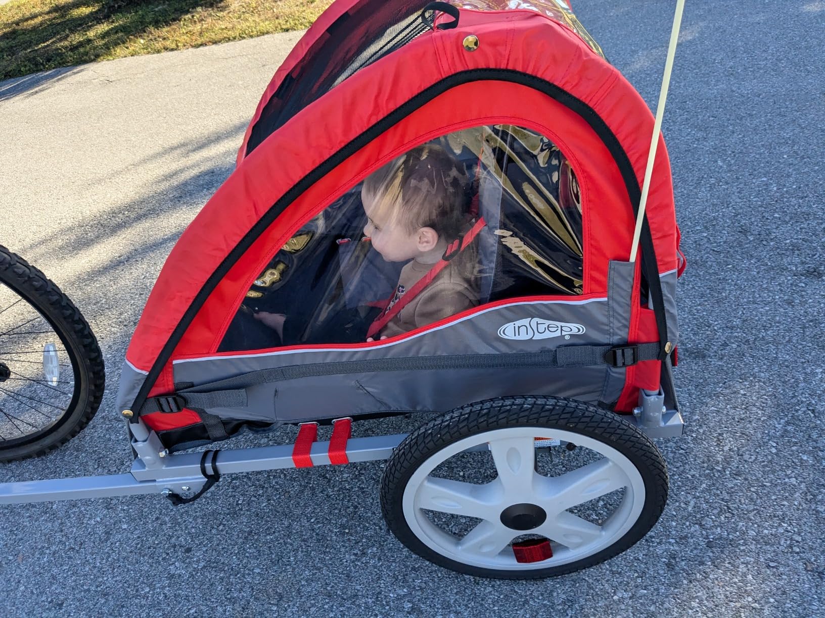 Instep Take 2 Double Seat Bike Child Trailer, Max Weight 80 lbs., 5-Point Harness, Folding Frame, Quick Release Wheels, Bug Screen & Weather Shield, Red customer photo 1
