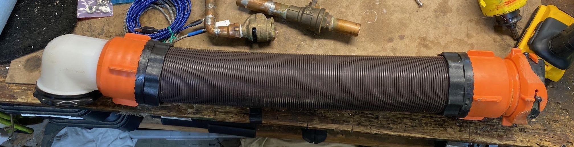 Camco RhinoFLEX 10' Camper/RV Sewer Hose Extension - Features Collapsible Design for RV Storage, Includes Pre-Attached Lug & Bayonet Fitting, Heavy Duty Polyolefin & Reinforced w/Steel Wire (39774) customer photo 2