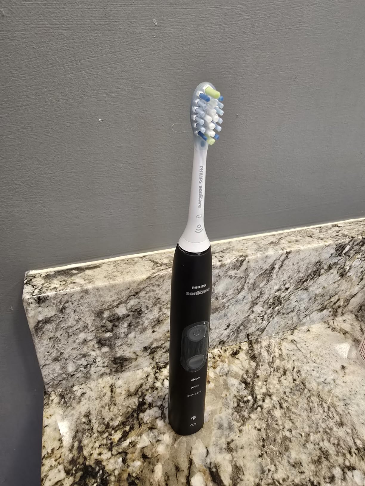 Philips Sonicare ProtectiveClean 5100 Rechargeable Electric Toothbrush, with Pressure Sensor, 3 Cleaning Modes, SmarTimer and QuadPacer, 14-Day Battery Life, Travel Case, Black, Model HX6850/60 customer photo 2