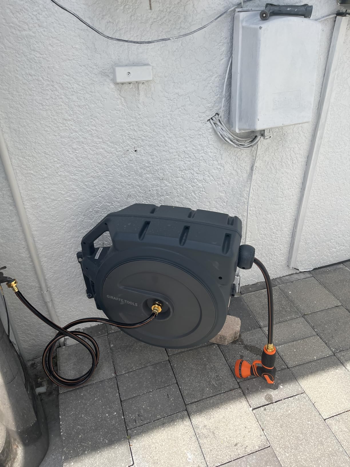 Giraffe Tools Retractable Garden Hose Reel 1/2 Inch x 130 ft, Super Heavy Duty, Any Length Lock, Slow Return System, Wall Mounted customer photo 2