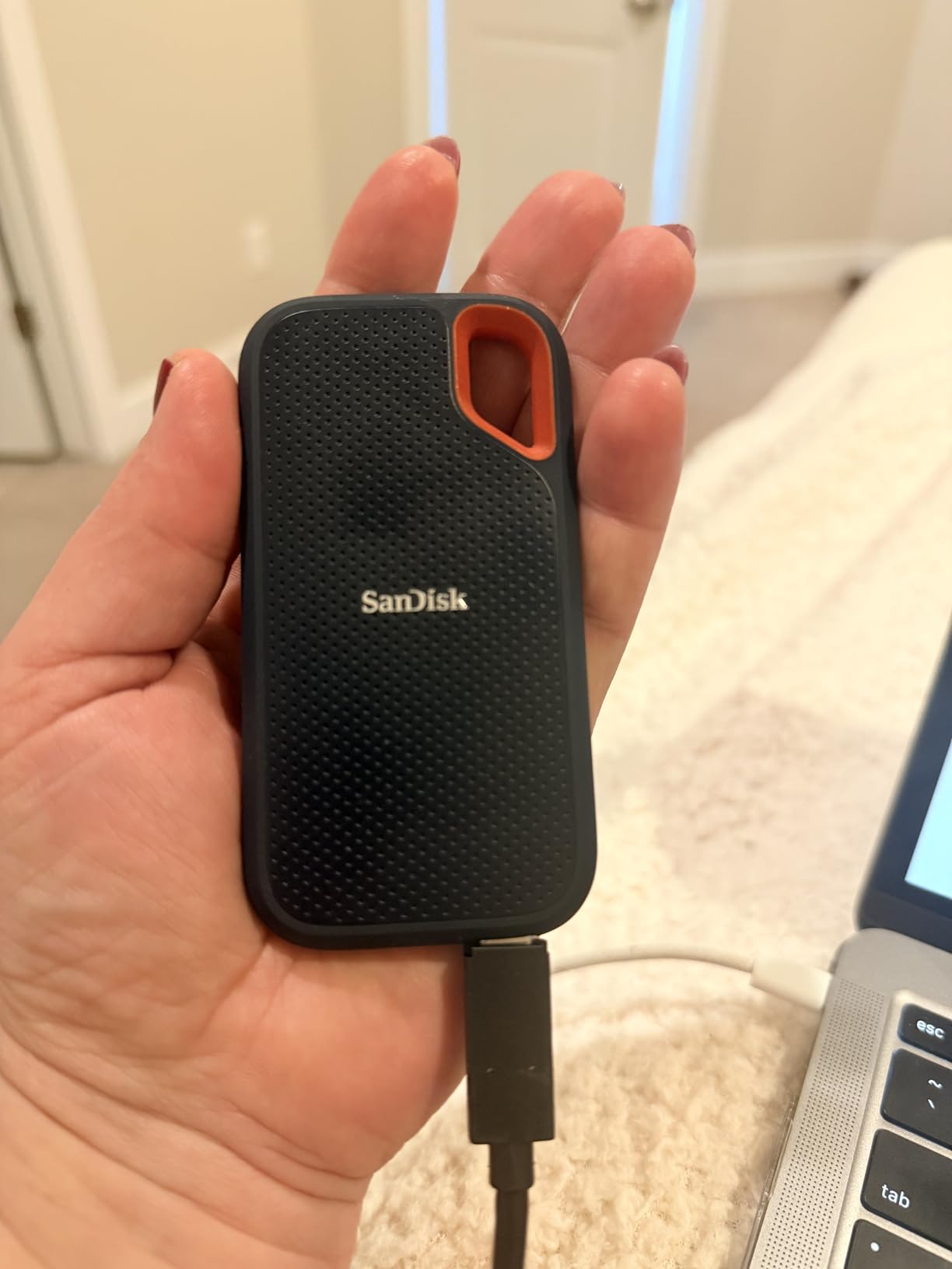 SANDISK 2TB Extreme Portable SSD (Old Model) - Up to 1050MB/s, USB-C, USB 3.2 Gen 2, IP65 Water and Dust Resistance - SDSSDE61-2T00-G25 customer photo 2