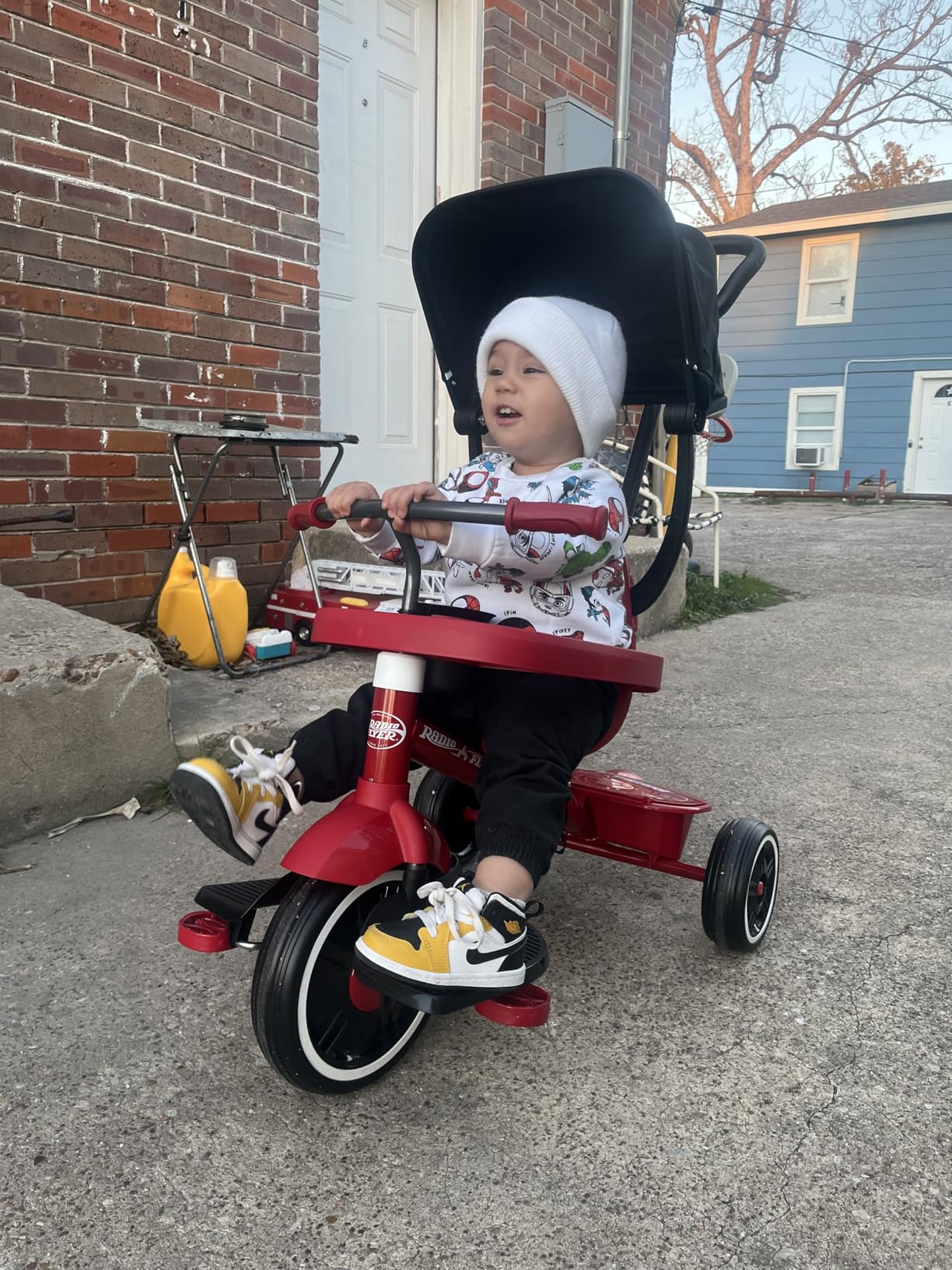 Radio Flyer 4-in-1 Stroll 'N Trike, Ages 1-5, Toddler Tricycle & Stroller, Foam Tires, Push Handle, UV Canopy, Removable Tray & Seatbelt, Amazon Exclusive customer photo 2
