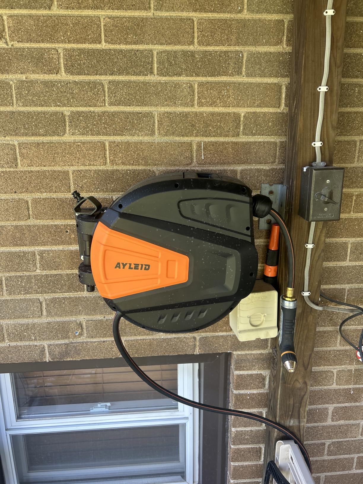 Ayleid Retractable Garden Hose Reel,1/2 in x 100 ft Wall Mounted Hose Reel, with 9-Function Sprayer Nozzle, Any Length Lock/Slow Return System customer photo 1