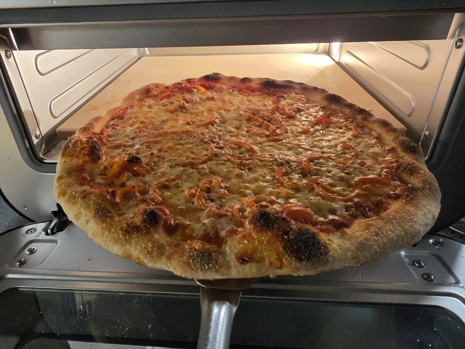 CHEFMAN Indoor Pizza Oven - Makes 12 Inch Pizzas in Minutes, Heats up to 800F - Countertop Electric Maker with 5 Touchscreen Presets, Pizza Stone and Peel Included - Stainless Black customer photo 1
