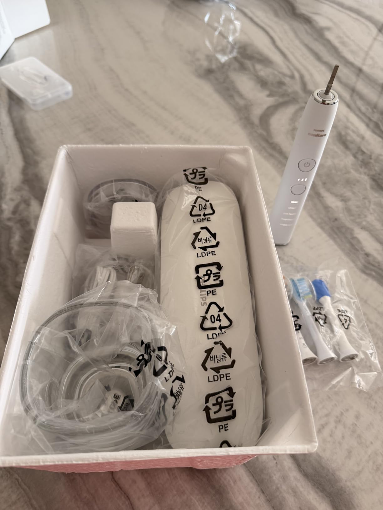 Philips Sonicare DiamondClean Smart 9500 Electric Toothbrush - Sonic Toothbrush with App, Pressure Sensor, 15 Brushing Settings, Replacement Reminder, USB Charging Travel Case, Black, Model HX9923/11 customer photo 1
