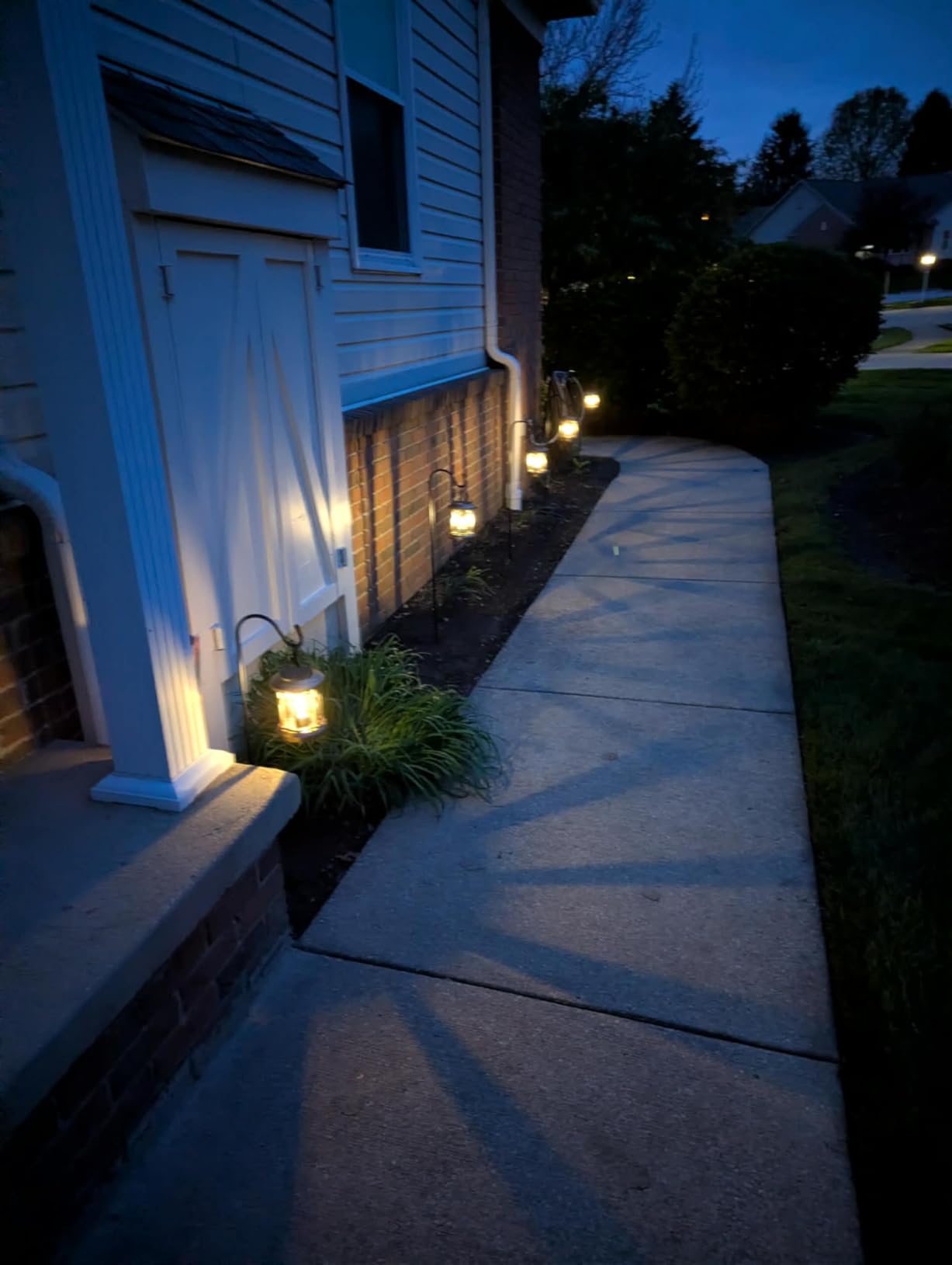 WdtPro Solar Lanterns Outdoor Waterproof, Upgraded Bright Hanging Solar Lights for Outside,Solar Powered Lanterns Lighting LED for Garden Patio Yard Decorative 2 Pack (Warm Light) customer photo 1