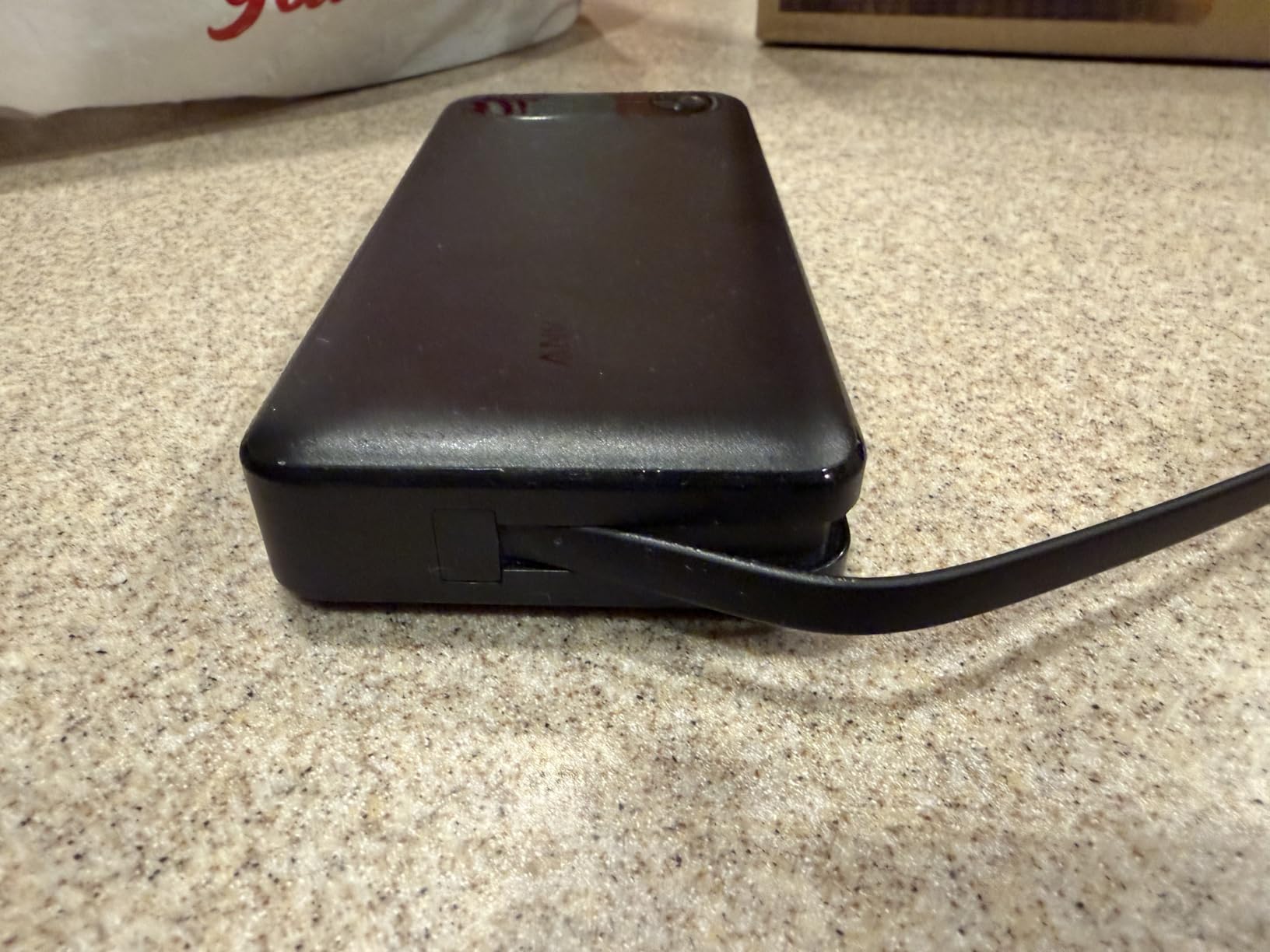 Anker Power Bank, 20,000mAh Travel Essential Portable Charger with Built-in USB-C Cable, 3-Port 87W Max Fast Charging customer photo 2