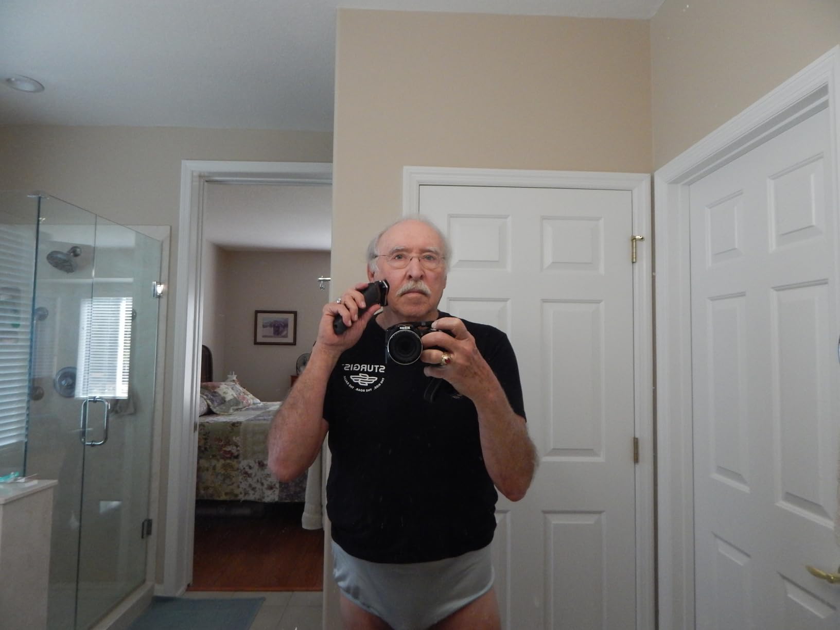 Philips Norelco Shaver 7300, Rechargeable Wet & Dry Electric Shaver with SenseIQ Technology, Pop-up Trimmer, Charging Stand, Click-on Nose Trimmer, & Travel Case, S7887/92 customer photo 1