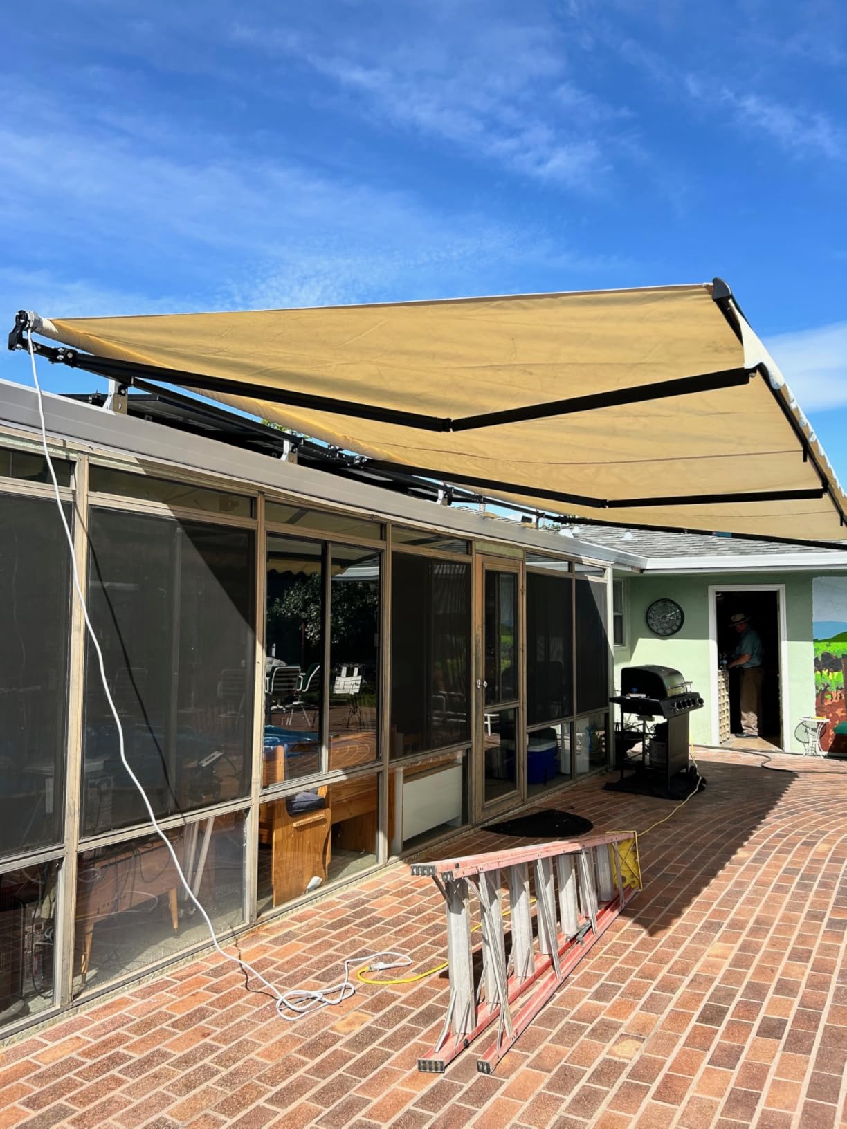 ALEKO Motorized Patio Awning 16x10 feet Electric Black Frame Awning, Remote Control Motorized & Manual Crank, Outdoor Shade Canopy with UV-Resistant Fabric - Caribbean Style Silver Gray customer photo 2