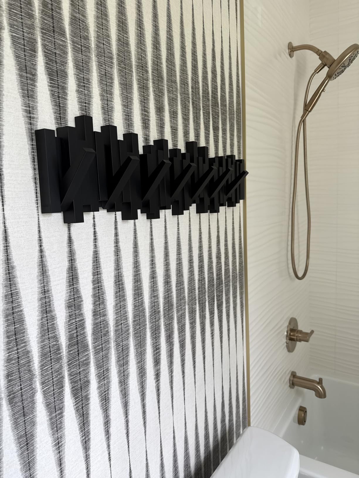 Umbra Sticks Wall-Mounted Coat Rack Rail Hook with 8 Retractable Pegs - Modern, Space-Saving Storage Organizer, Black customer photo 2