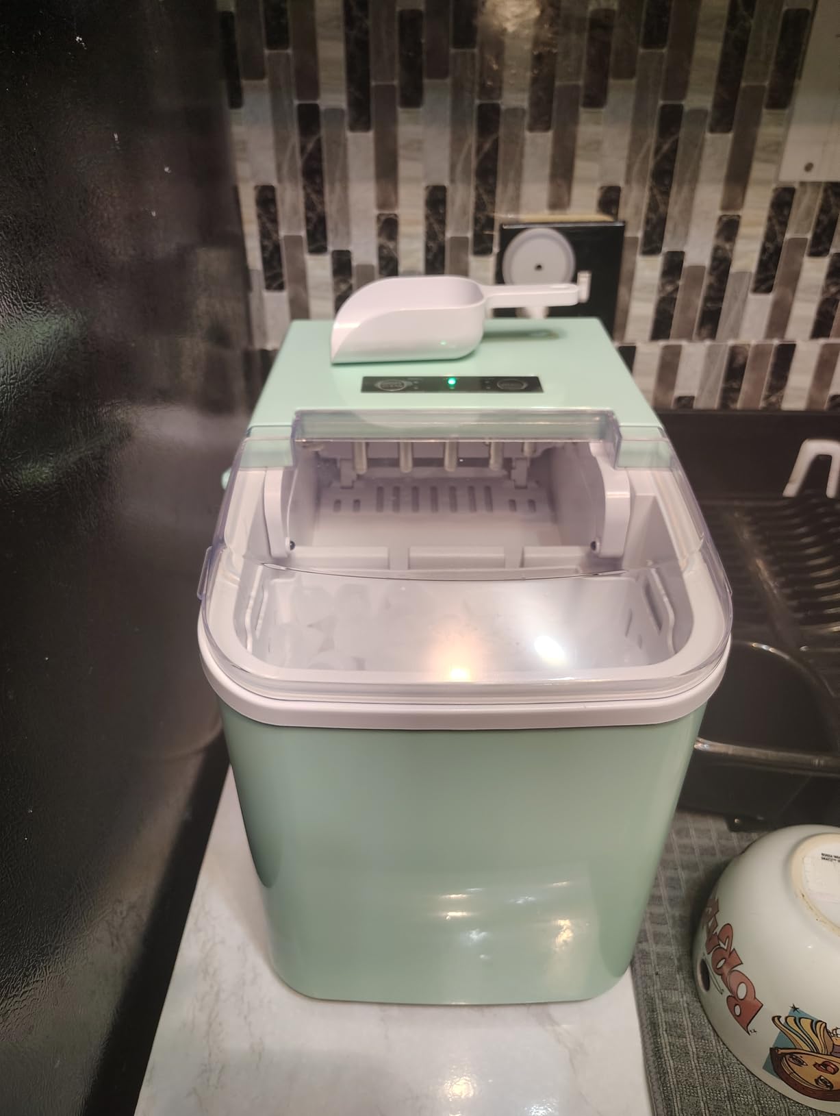 DUMOS Countertop Ice Maker with Handle, 26lbs/24H Portable Ice Machine, 9 Bullet Cubes Ready in 6 Mins, Self-Cleaning, Quiet Compact for Home, Kitchen, RV, Camping, Bright Black customer photo 1